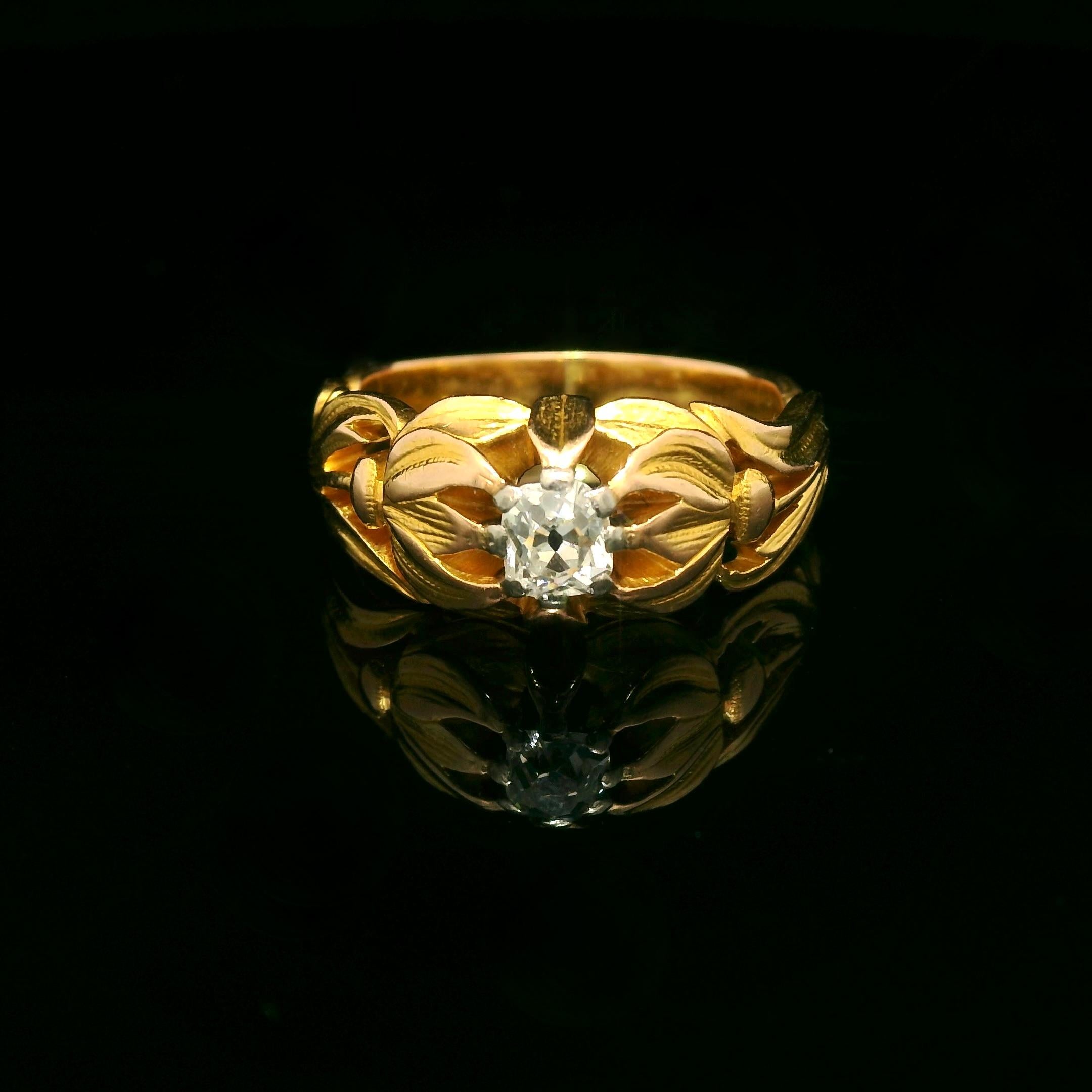 Art Nouveau Ring circa 1900

The ring is made of yellow gold 18 Karat and Is set with a center old mine diamond of approximately 0.40 Carats (estimated G color - Vs clarity). 

The diamond is bright and lively. 

The ring is in e very good