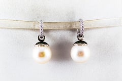 Art Nouveau 0.55 Carat White Diamond Emerald Pearl White Gold Dangle Earrings