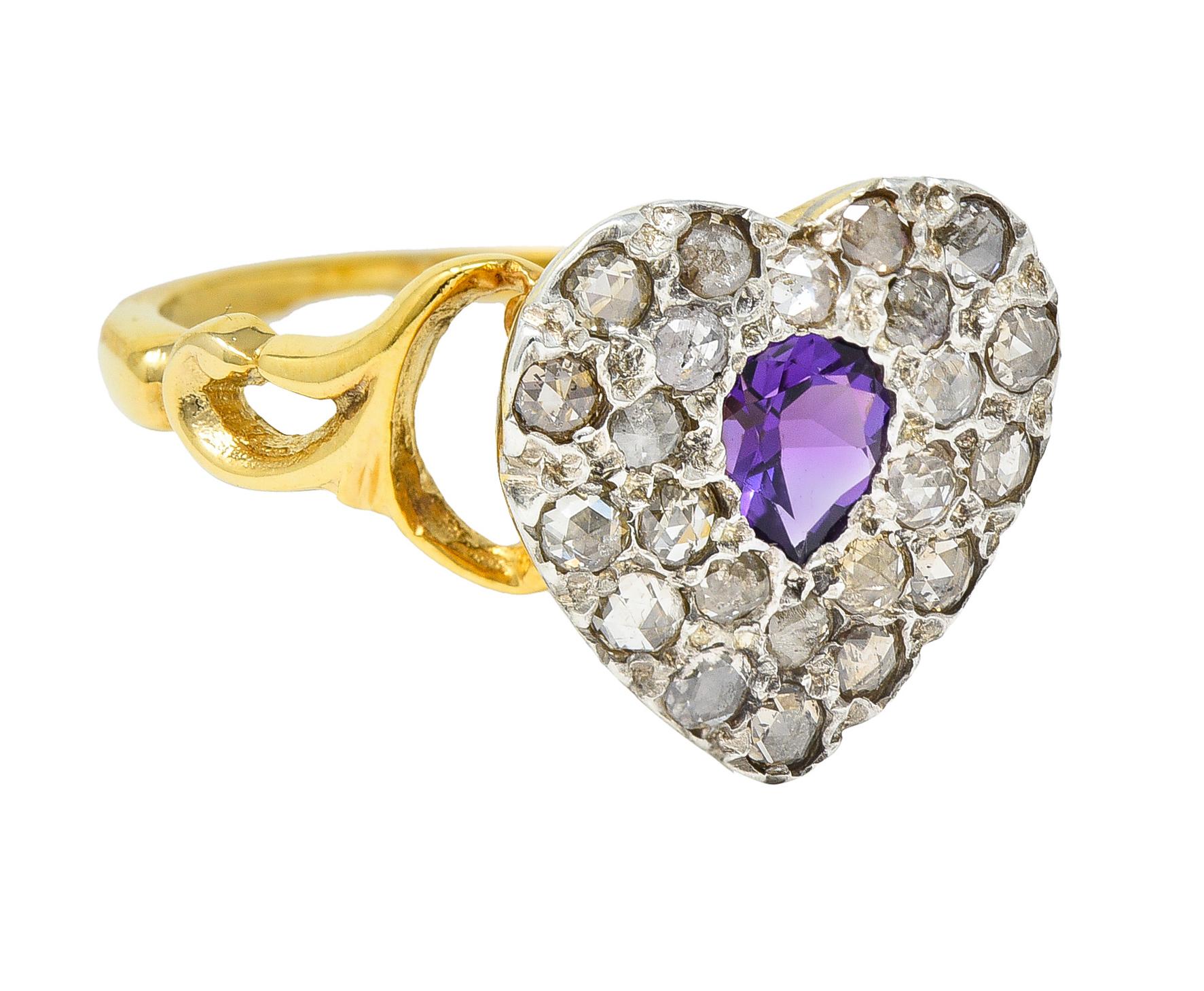 Centering a pear cut amethyst weighing approximately 0.23 carat - transparent medium purple
Bead set in a silver-topped heart form with a clustered surround of rose cut diamonds
Bead set and weighing approximately 0.51 carat total - quality