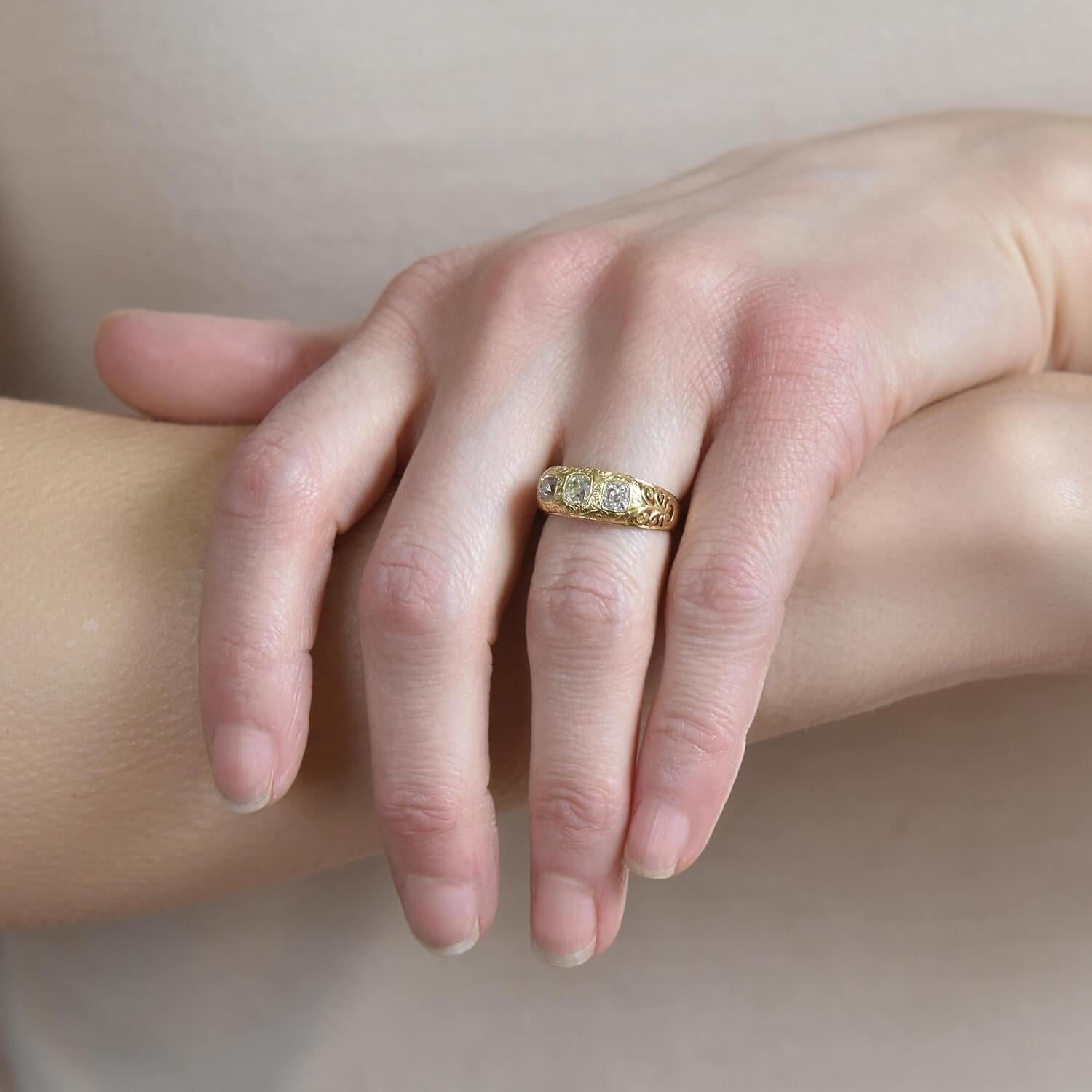 Women's Art Nouveau 1.00 Total Carat Mine Cut Diamond 3-Stone Ring For Sale