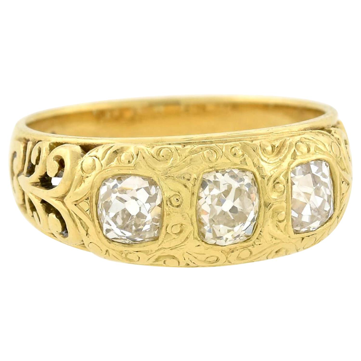 Art Nouveau 1.00 Total Carat Mine Cut Diamond 3-Stone Ring For Sale