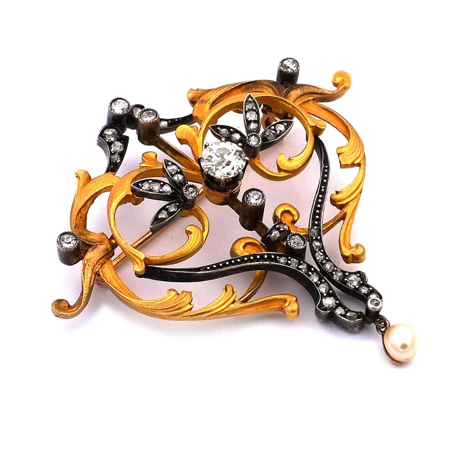 Art Nouveau 1.2ct Diamond 18K Gold Brooch circa 1900

Magnificent Art Nouveau brooch made of high-quality gold in the form of an openwork cartouche made of very fine leaf tendrils and flowers, centrally set with a large old-cut diamond weighing