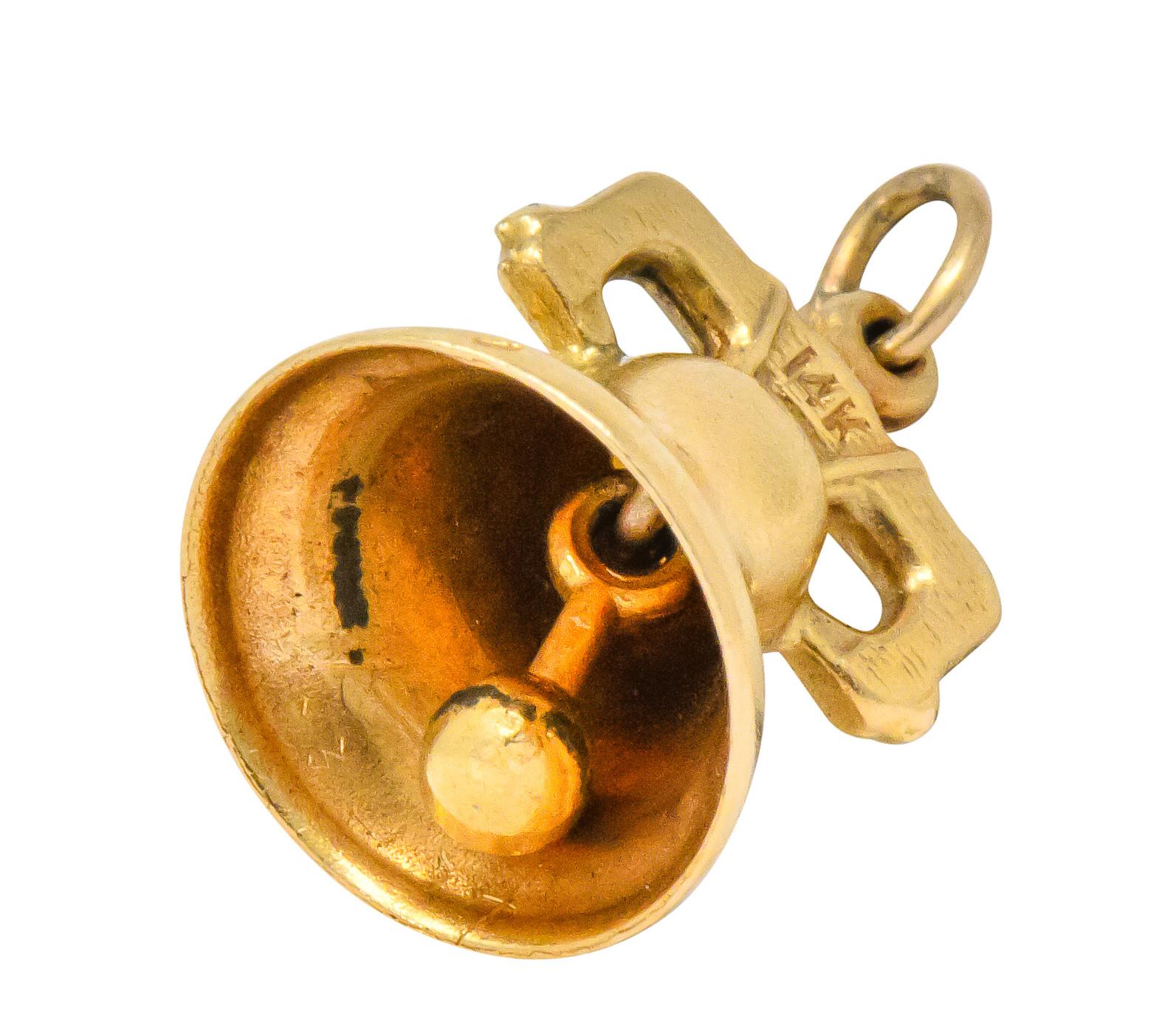 Liberty Bell charm with engraved crack detail and textured yoke frame

With articulated clapper creating a delicate ring

Stamped 14k for 14 karat gold

Circa 1910

Measures: approx. 1/2 x 3/4 (including bale) inch

Total weight: 1.9