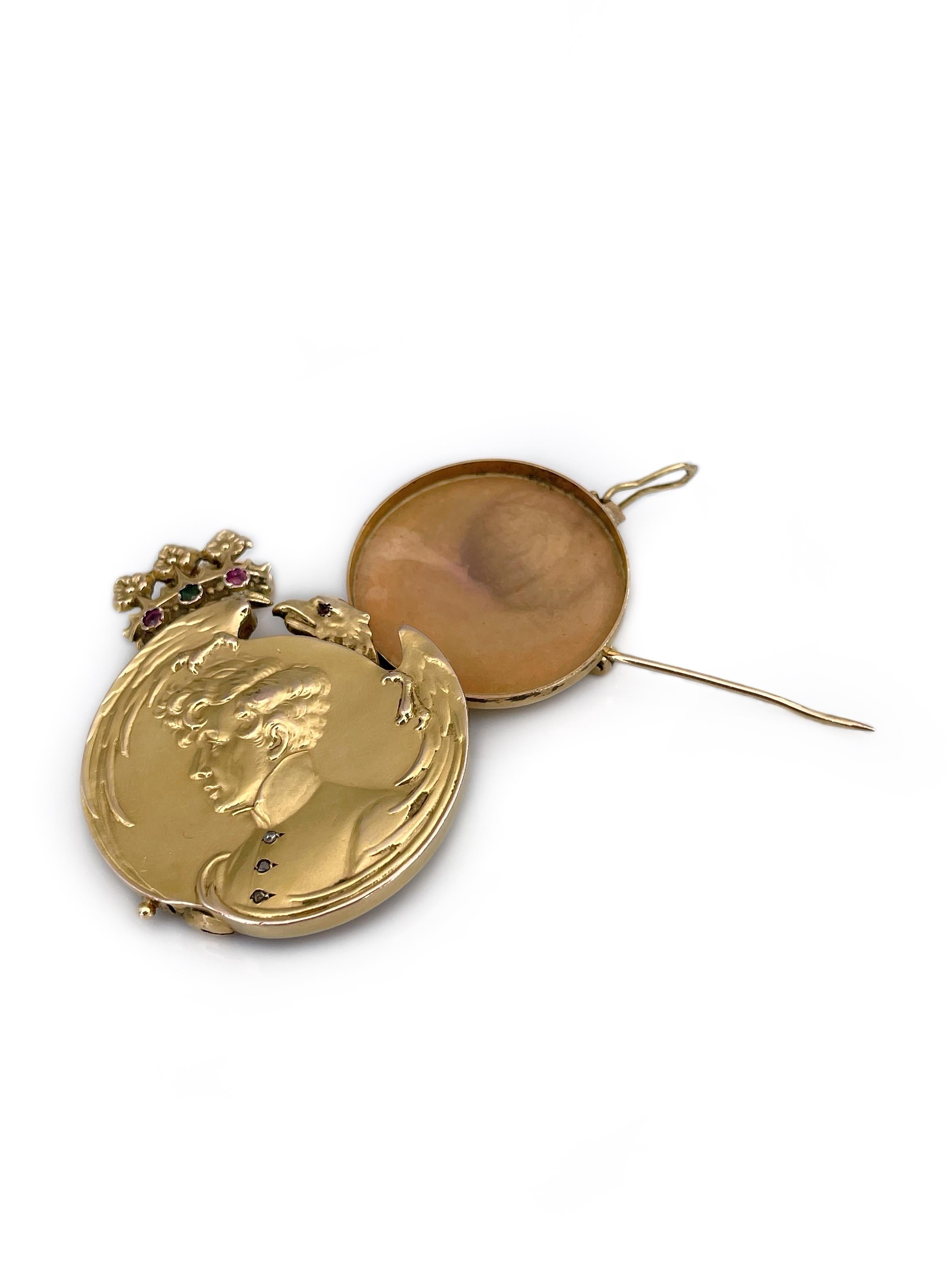This is an amazing Art Nouveau locket pendant-brooch. The piece is crafted in 14K yellow gold. It depicts a portrait of Napoleon II (son of Napoleon Bonaparte), an eagle and a crown. The piece is adorned with rose cut diamonds and colorful garnets.