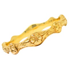 Bracelet jonc ancien Art Nouveau en or jaune 14 carats avec fleur de panthère