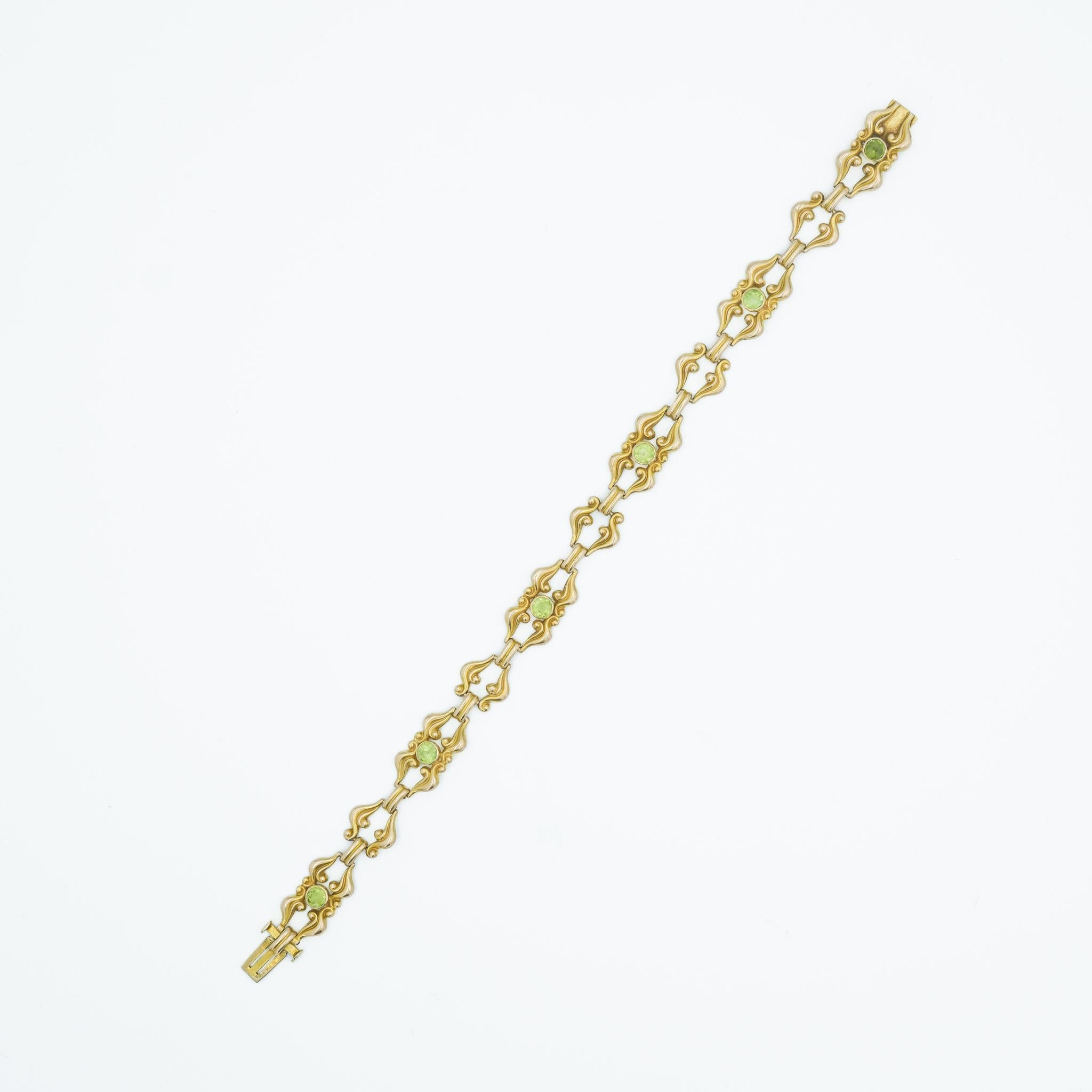 Women's Art Nouveau 14 Karat Yellow Gold Scroll Work and Green Gemstone Link Bracelet For Sale
