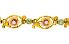 Art Nouveau 1.44 Carat Peridot Enamel Pearl 14 Karat Gold Link Bracelet