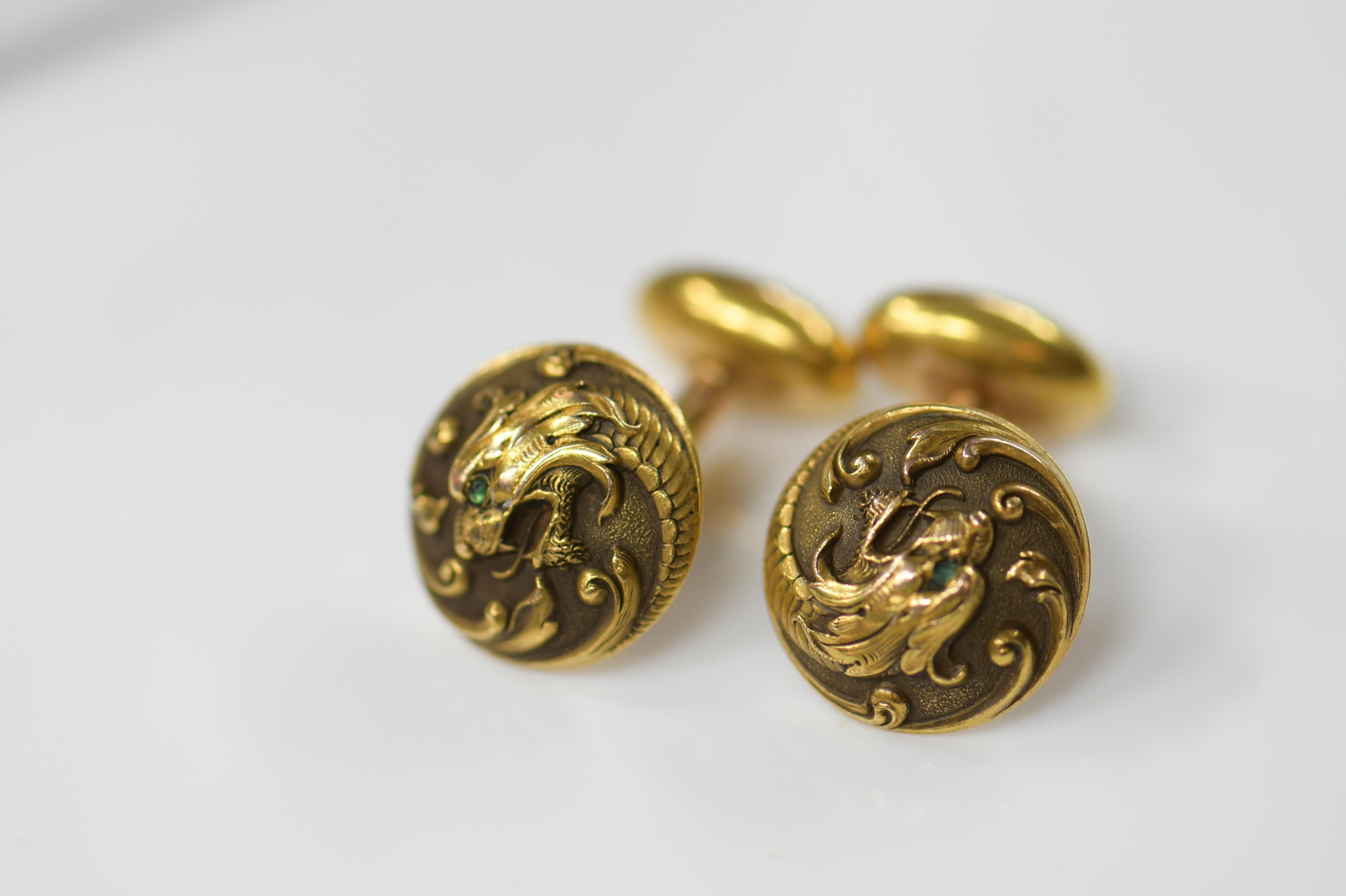 A stunning pair of antique 14 karat yellow gold cufflinks.

These fine and impressive antique gold cufflinks have been crafted in 14k gold settings.

 Dragon design and gold work is absolutely stunning. Unique collector piece. 

Perfect