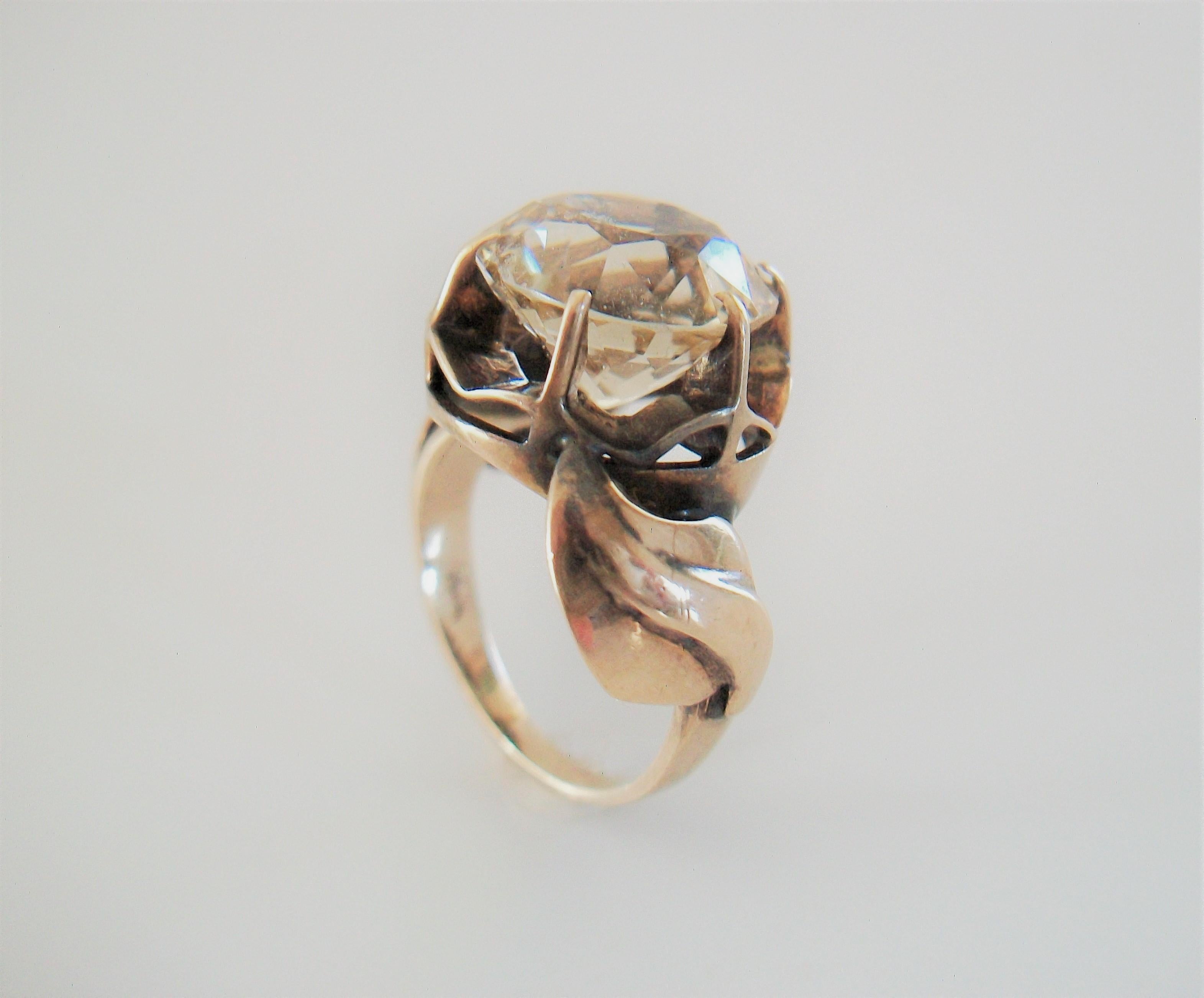 Art Nouveau style 14K yellow gold flower form cocktail ring - prong set with a 6.5 carat (approx. size) pale yellow round faceted Citrine gemstone - custom made - asymmetrical applied gold leaves to each side of the band - unsigned - United States