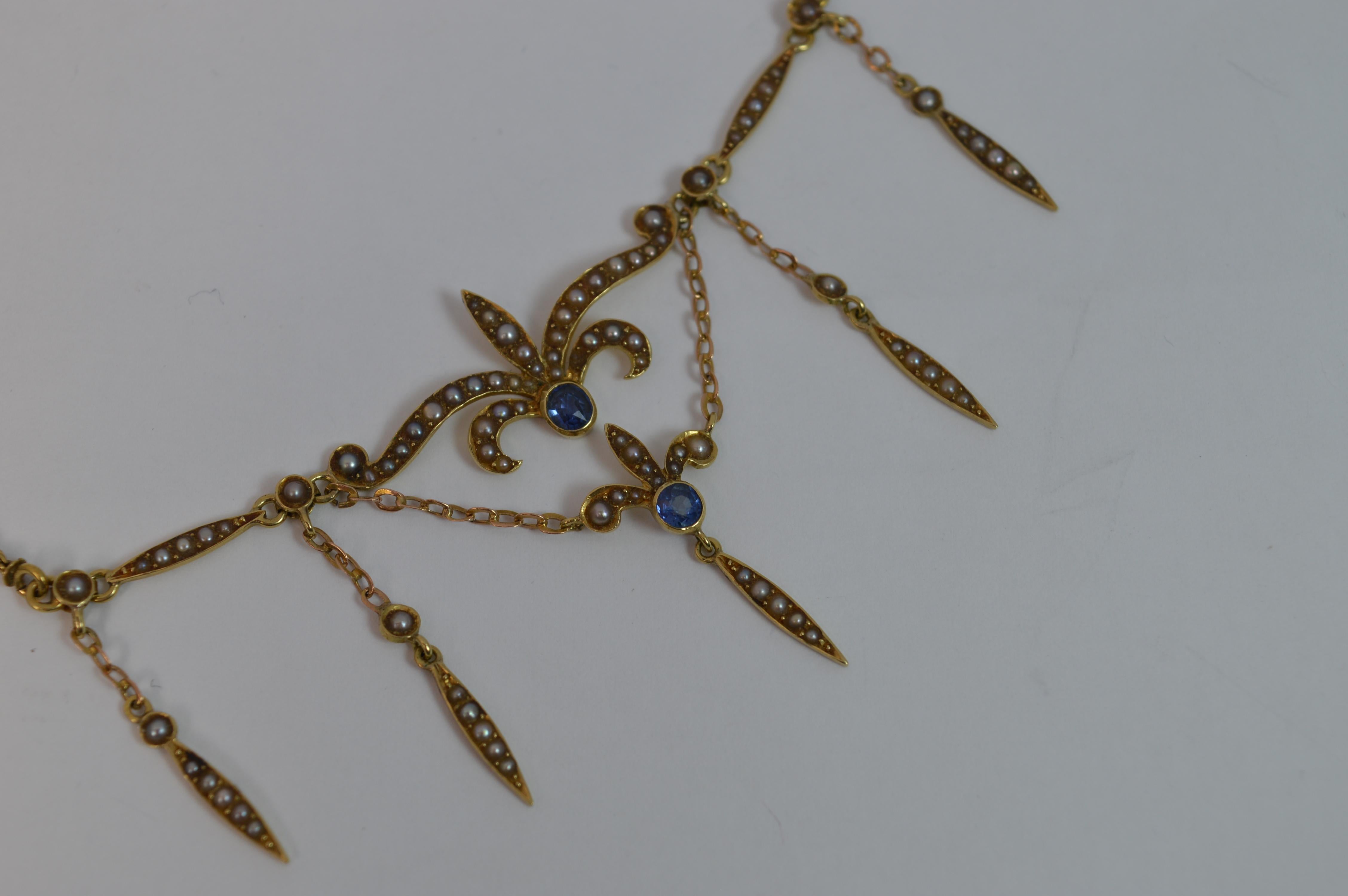 Edwardian Art Nouveau 15 Carat Gold Sapphire and Seed Pearl Long Necklace Pendant