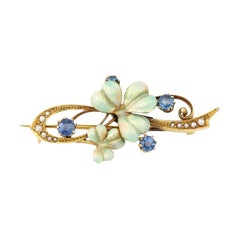 Art Nouveau 15ct Gold Sapphire, Enamel and Pearl Flower Brooch, circa 1910 Art Nouveau 15ct Gold Sapphire, Enamel and Pearl Flower Brooch, circa 1910