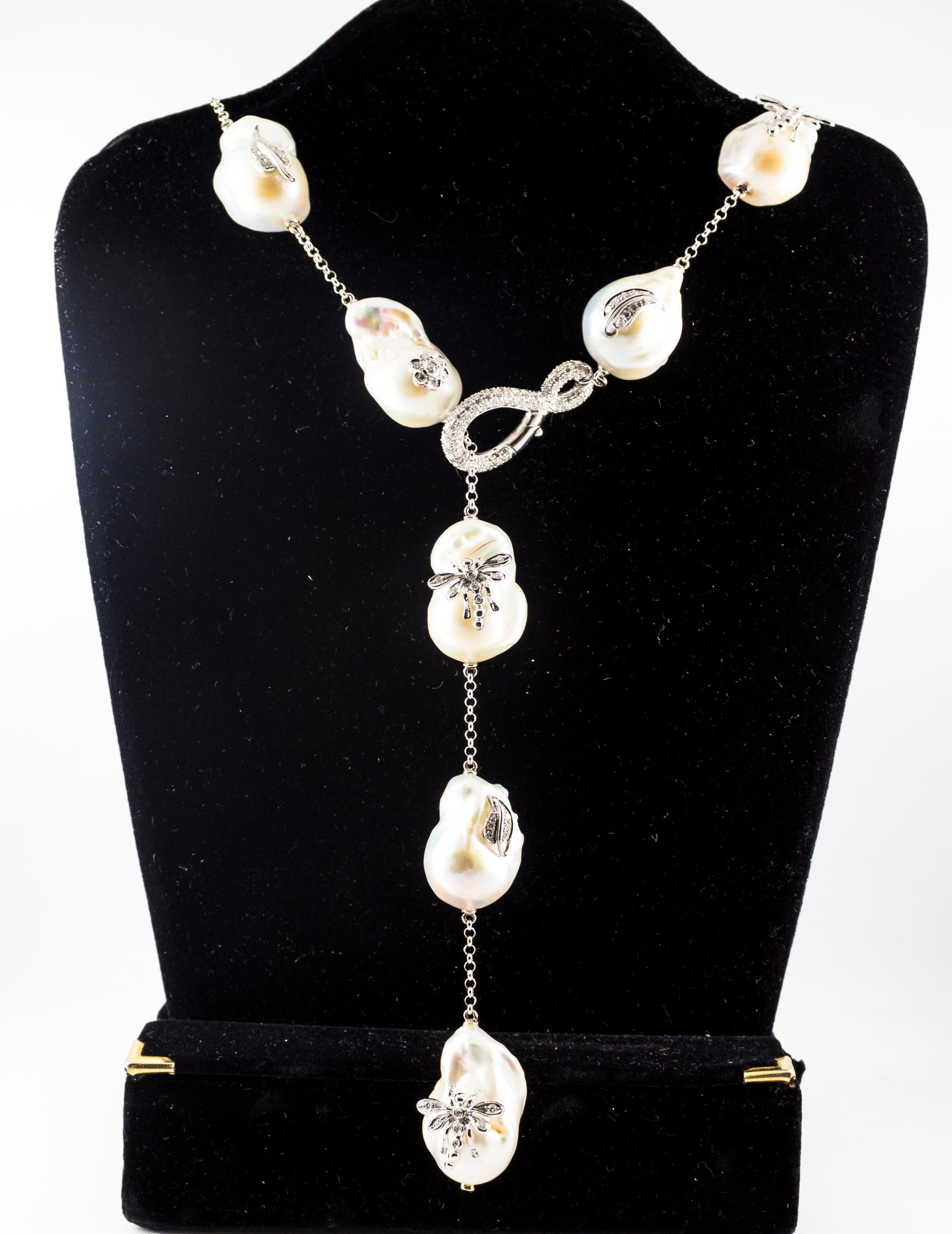 This Necklace is made of 18K White Gold.
This Necklace has 1.75 Carats of White Diamonds.
This Necklace has 342.00 Carats of Pearls.
We're a workshop so every piece is handmade, customizable and resizable.
