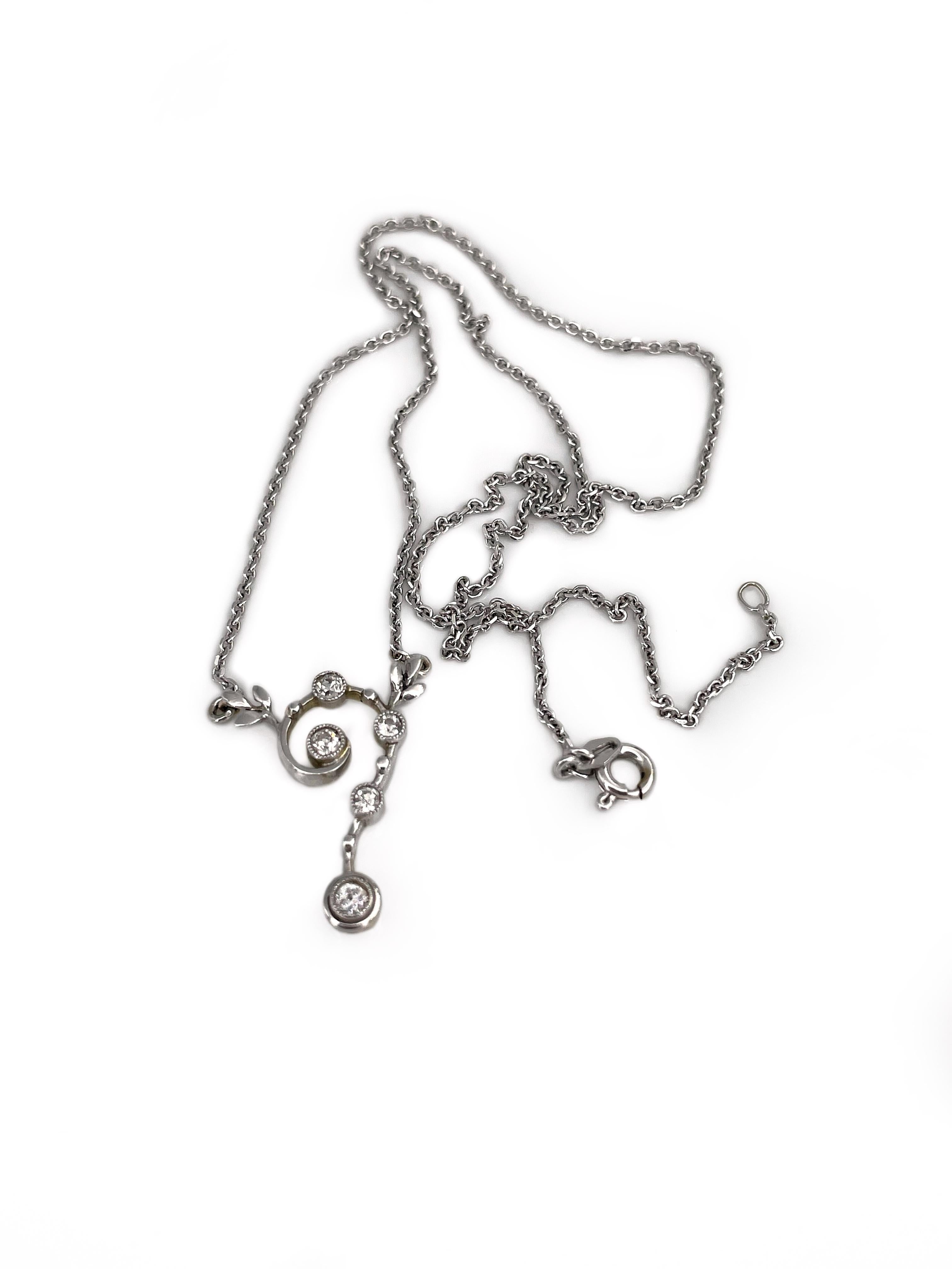 This is an elegant Art Nouveau Question Mark collier necklace crafted in 18K white gold. It features 5 old European cut diamonds (TW 0.225ct, W, VS) and is adorned with floral motifs.

Weight: 5.15g
Chain length: 46.5cm
Pendant length:
