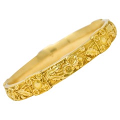 Bracelet jonc ancien Art nouveau en or jaune 18 carats avec fleur de coquelicot