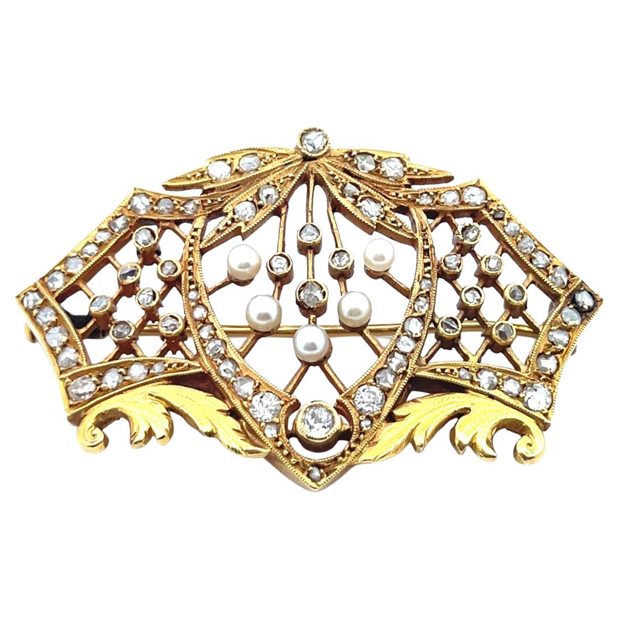 Spilla Art Nouveau con diamanti e perle in 18 carati