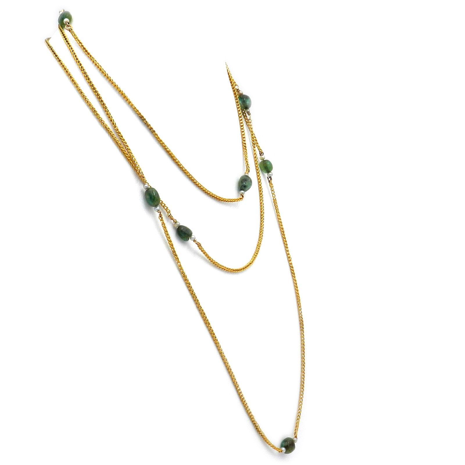 Art Nouveau 18K Gold Emerald and Oriental Pearl Chain Necklace, circa 1910

Elegant, extra-long foxtail chain made of 18K gold, decorated with nine emeralds, each flanked by two oriental pearls. 


18K yellow gold
9 emerald oval stones, approx. 6 x