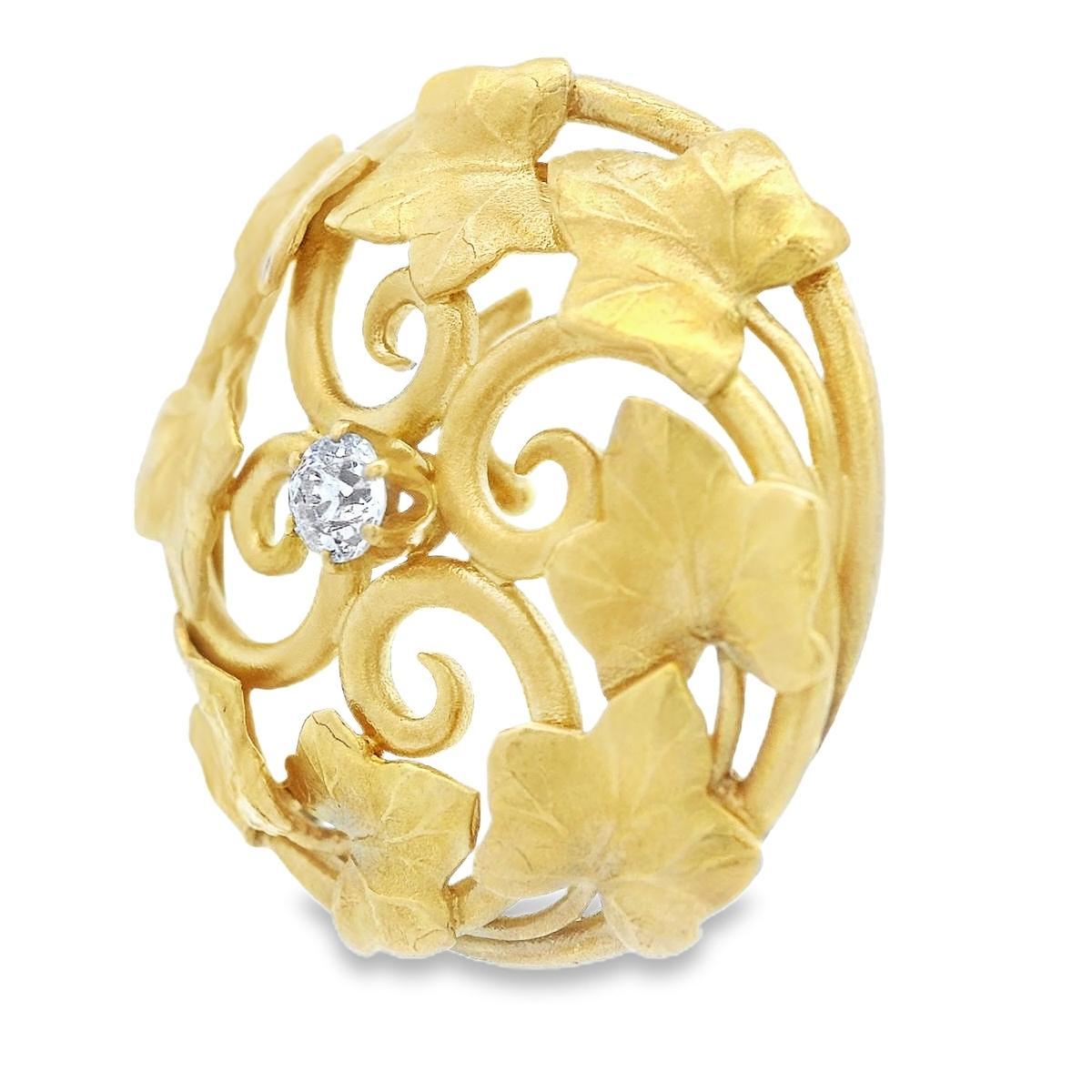 This beautiful floral watch holder is made in 18k yellow gold with  an old mine cut diamond and comes from the Art Nouveau period. The dual bales on the back of this watch holder allow for this beautiful charm to be worn as a pendant, or center of a