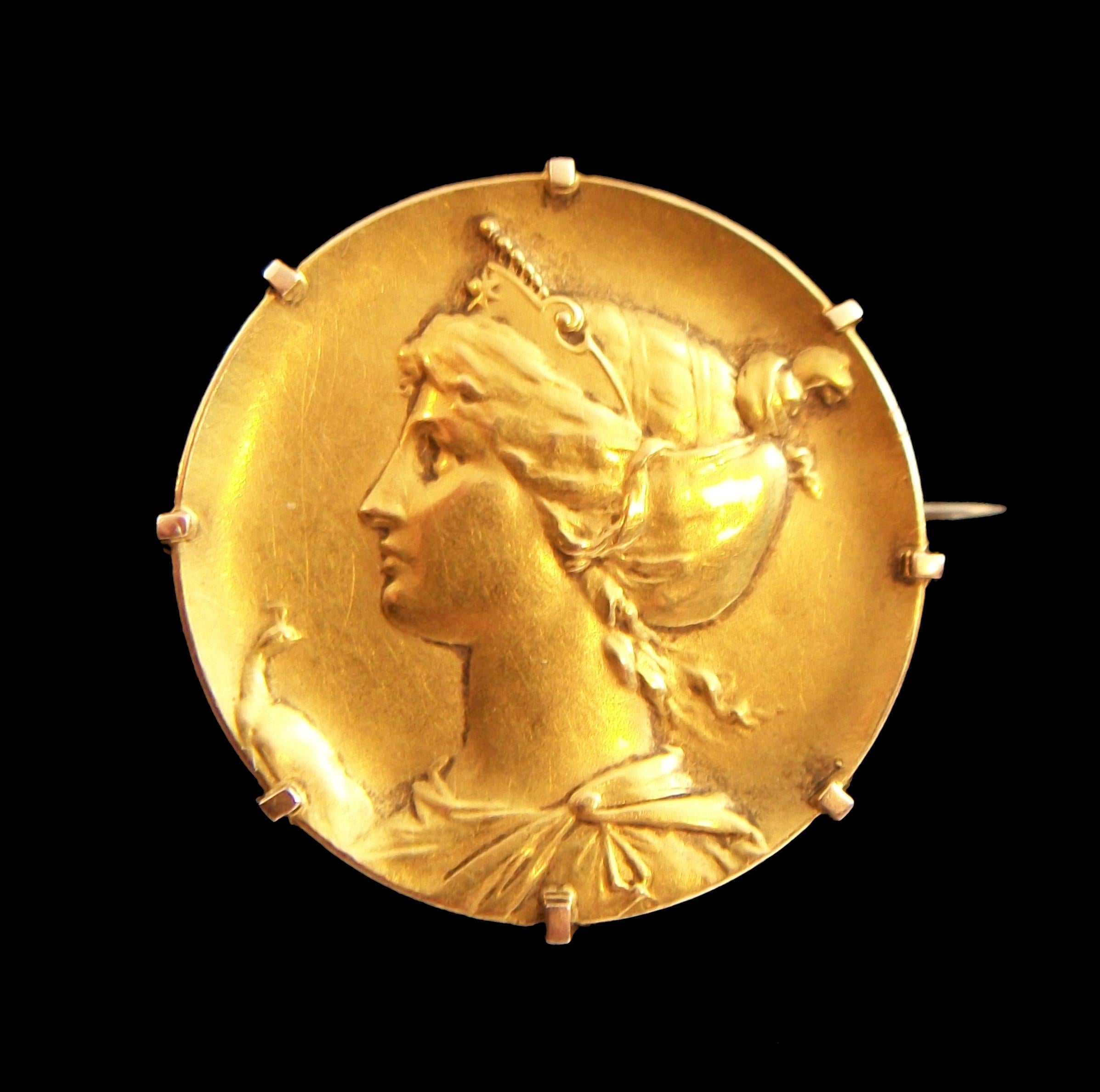 Art Nouveau 18K yellow gold portrait brooch - featuring a classical style portrait bust in relief with a peacock to one side - original steel pin with gold tube hinge and c catch to the back - French gold purity stamp on the c catch - France - circa