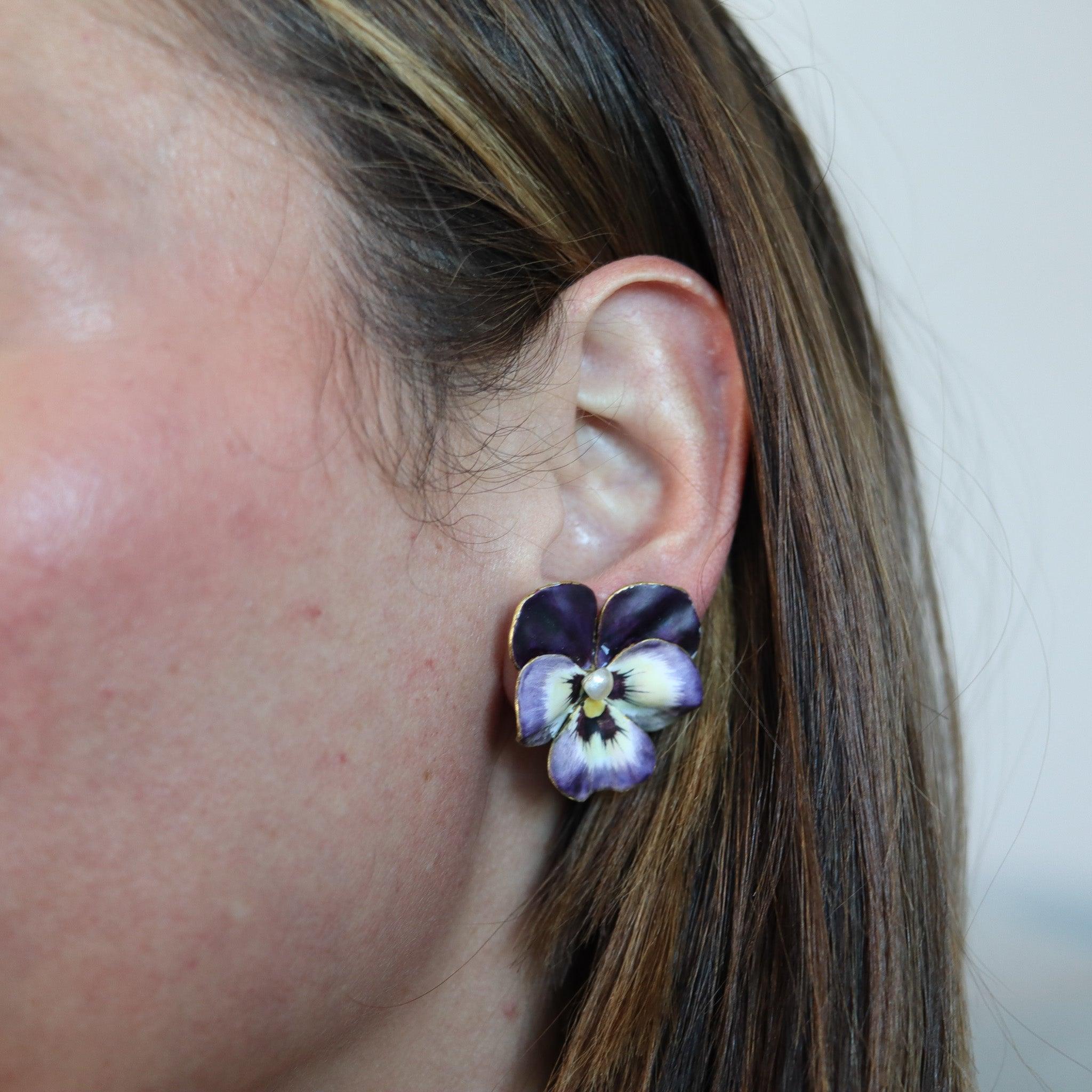 Art nouveau Pansy flower earrings.

These are a beautiful and colorful pair of clips earrings, created in America during the Art Nouveau periods, back in the 1900. These unique different earrings have been carefully crafted in the shape of pansy