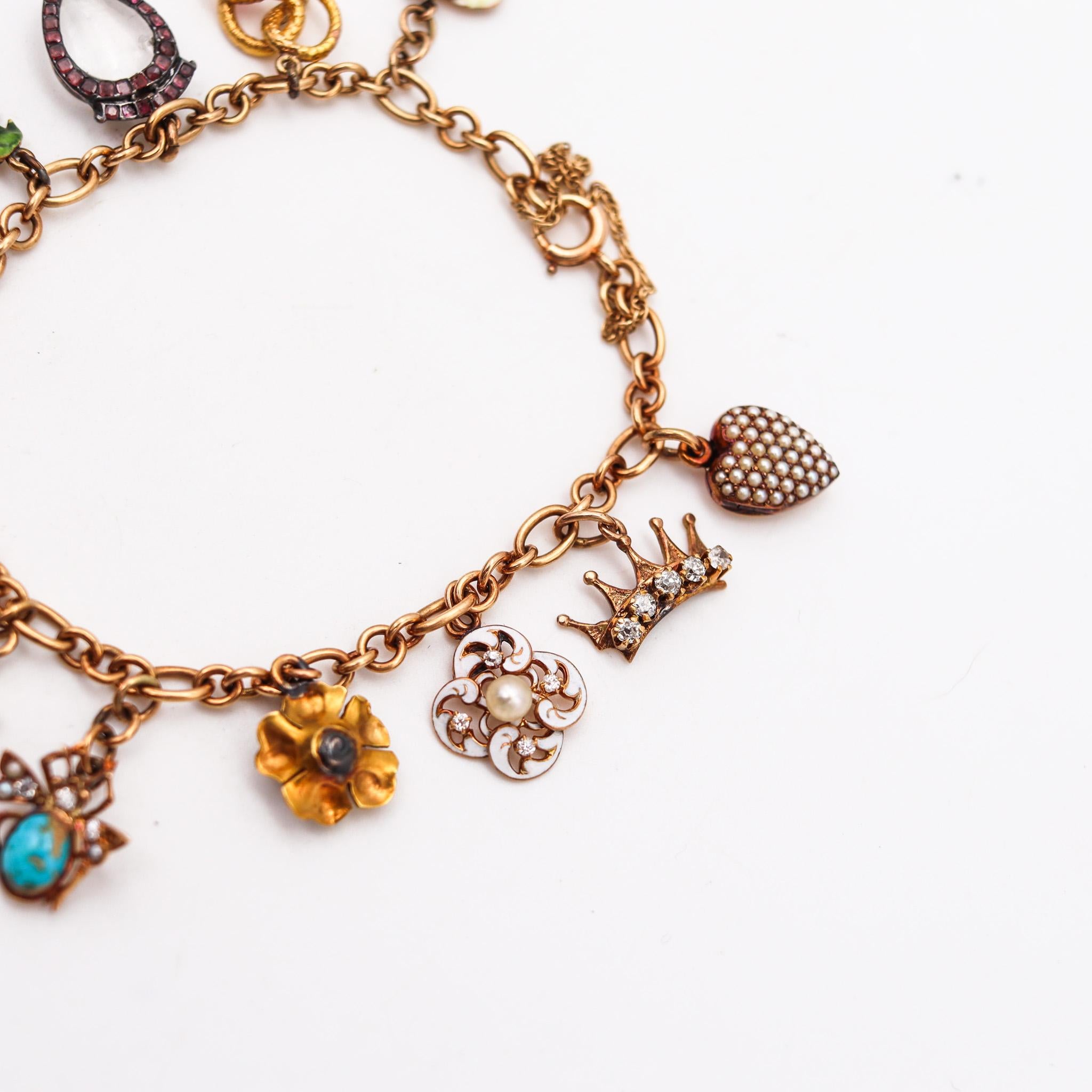 Women's Art Nouveau 1910 Charms Bracelet In 14Kt Gold With Multi Gemstones And Enamels For Sale