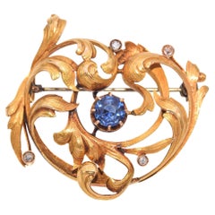Spilla Art Nouveau in oro giallo 20 carati con zaffiro sintetico e diamanti taglio rosa