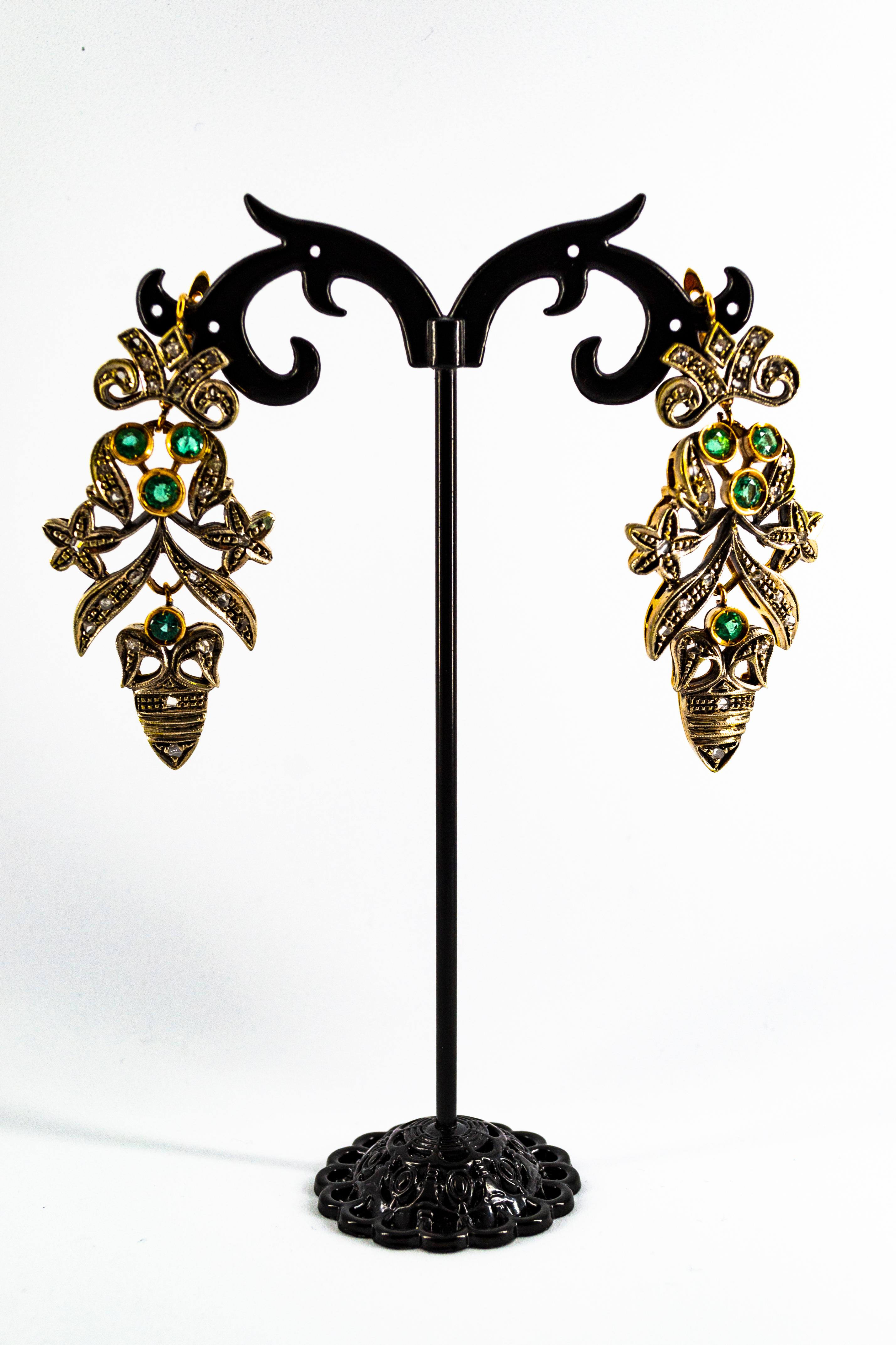 These earrings are made of 9K Yellow Gold and Sterling Silver.
These Earrings have 0.60 Carats of White Rose Cut Diamonds. 
These Earrings have 1.60 Carats of Emeralds.
The earrings are inspired by Art Nouveau so they're vintage reproduction.
We're