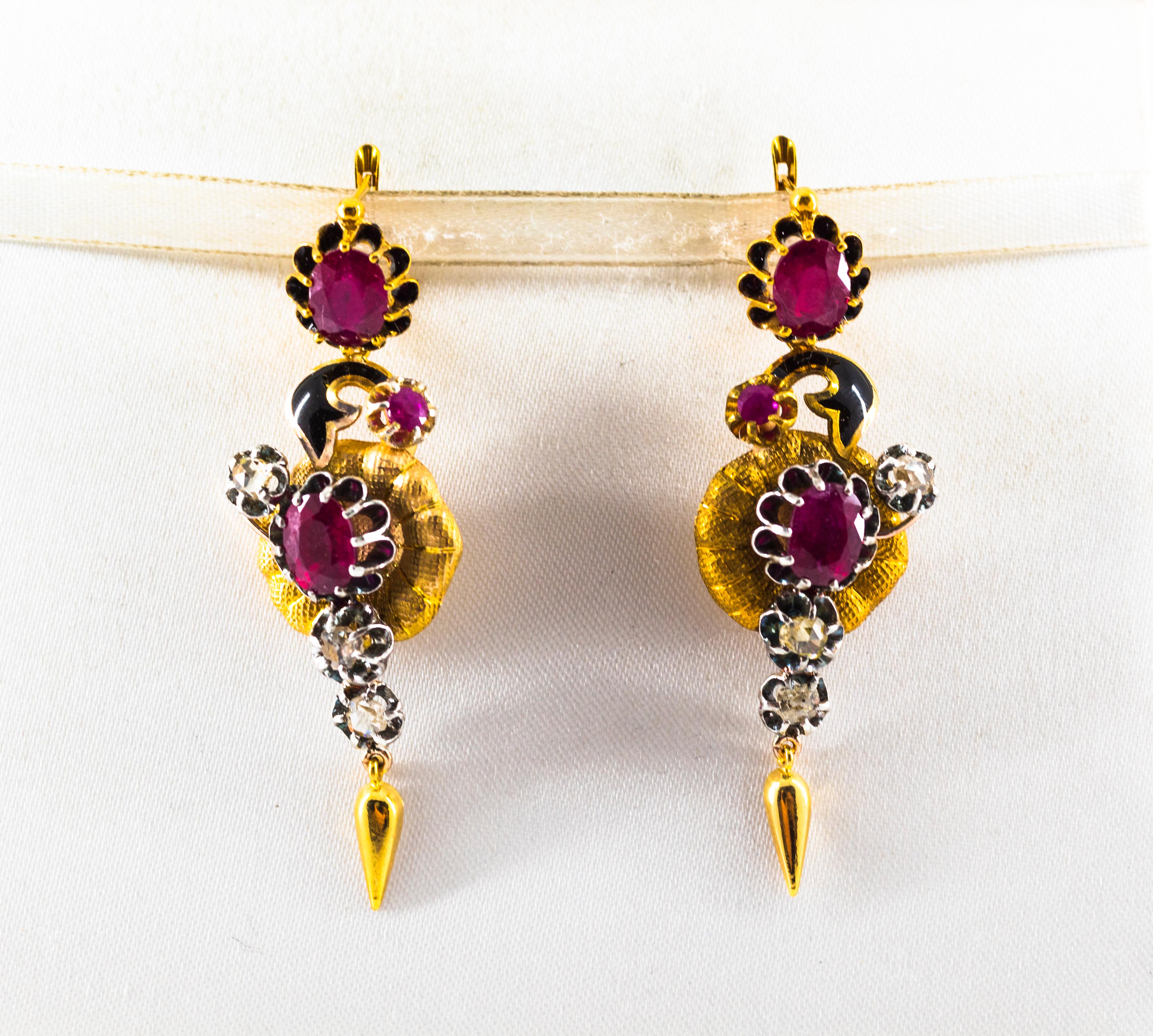 These Lever-Back Earrings are made of 9K Yellow Gold and Sterling Silver.
These Earrings have 0.90 Carats of White Rose Cut Diamonds.
These Earrings have 4.00 Carats of Rubies.
These Earrings have also Black Enamel.
All our Earrings have pins for