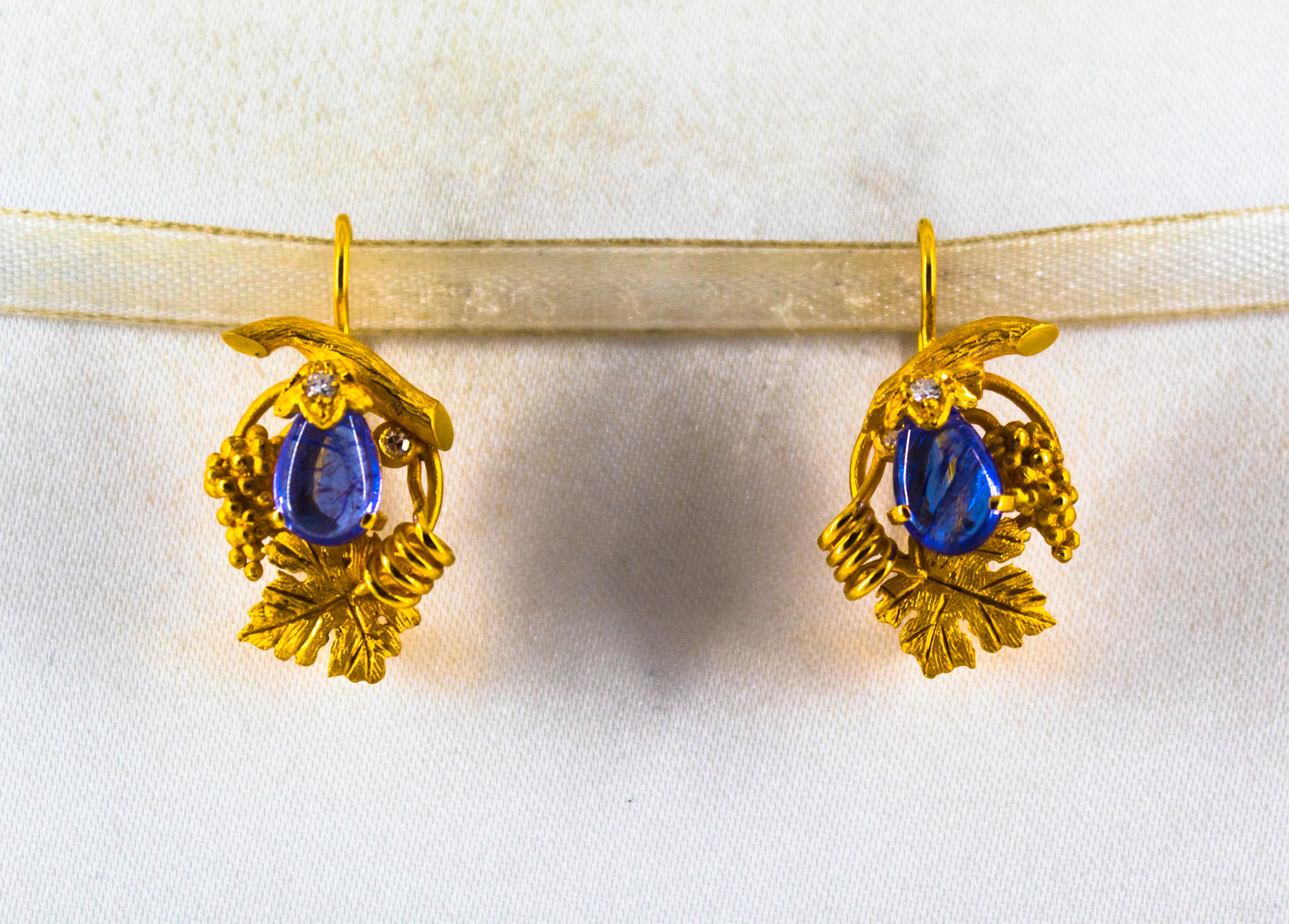 These Earrings are made of 14K Yellow Gold.
These Earrings have 0.12 Carats of White Brilliant Cut Diamonds.
These Earrings have 5.00 Carats of Tanzanite.

These Earrings are available also with Aquamarine.

These Earrings are inspired by Art