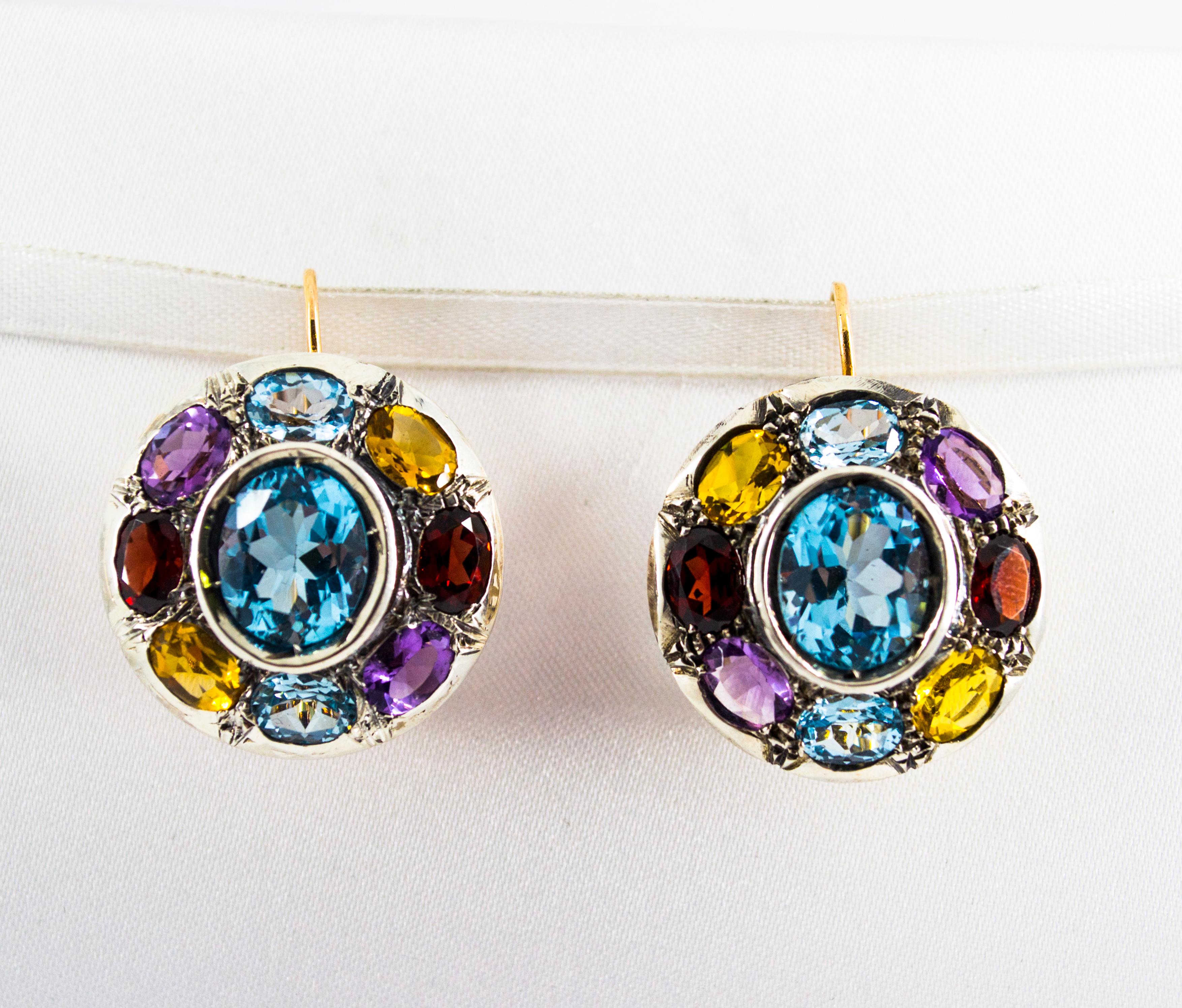 These Earrings are made of 9K Yellow Gold and Sterling Silver.
These Earrings have also Blue Topaz, Amethyst, Citrine, Garnet and Peridot.
All our Earrings have pins for pierced ears but we can change the closure and make any of our Earrings