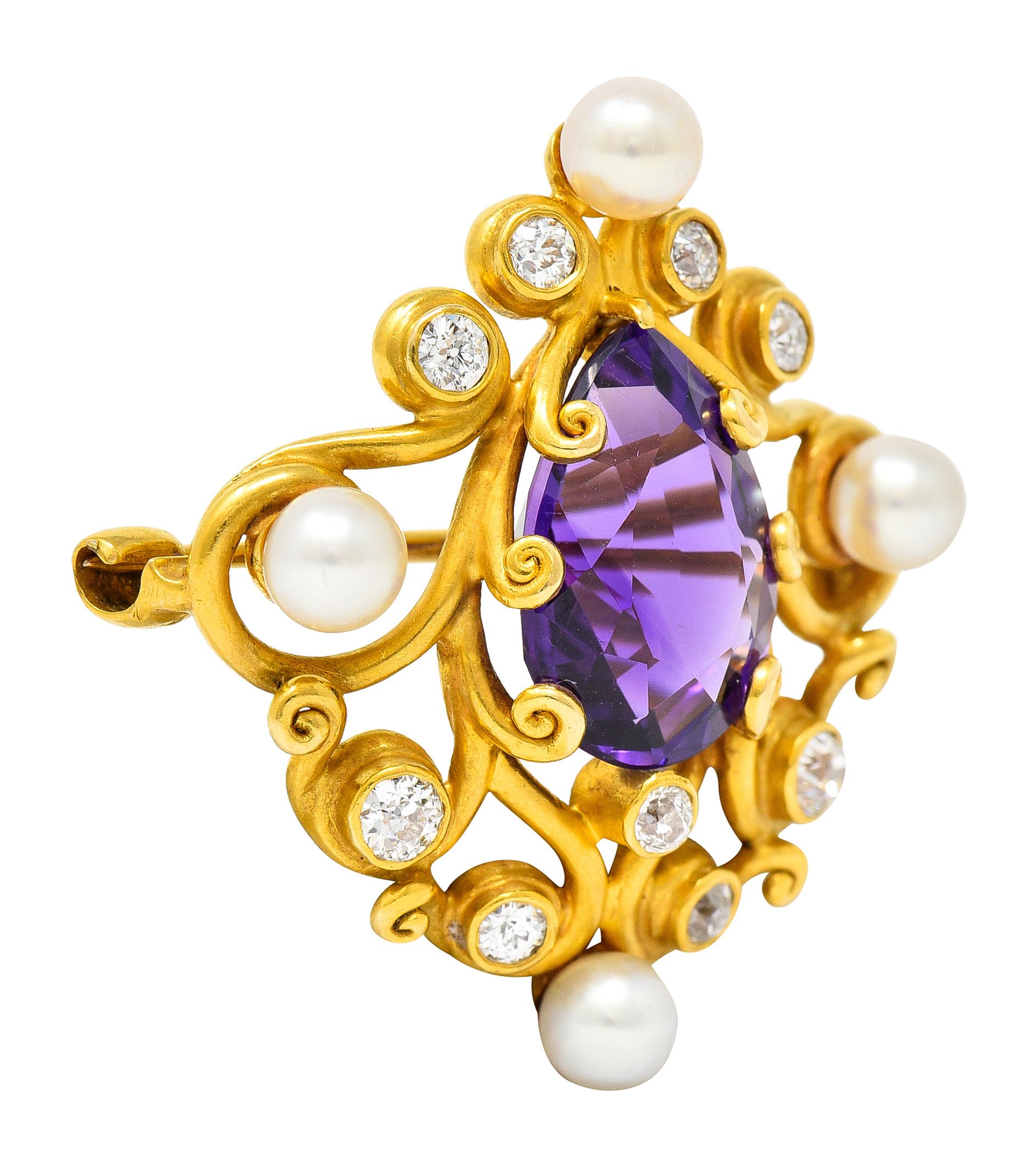 Brooch is designed as winding matte gold tendrils. Centering a pear cut amethyst measuring approximately 13.0 x 9.0 mm. Eye clean and richly purple in color with medium saturation. With 4.0 mm round pearls at each cardinal point. Well matched, white