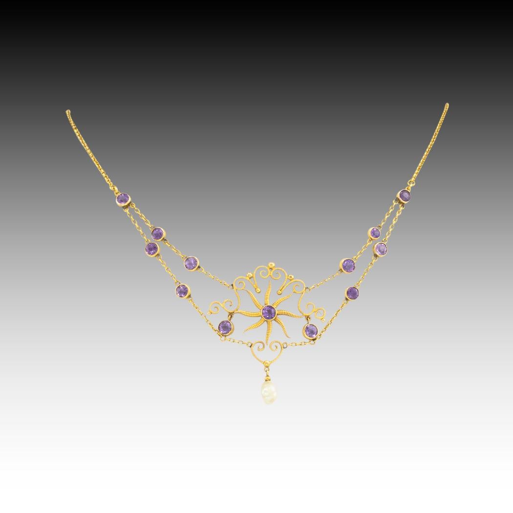 Art Nouveau amethyst and pearl gold necklace circa 1905. *

ABOUT THIS ITEM:  # N-DJ111B.  Scroll down for detailed specifications.  This delicate Art Nouveau necklace represents elements that distinguish it from the overly elaborate or complicated