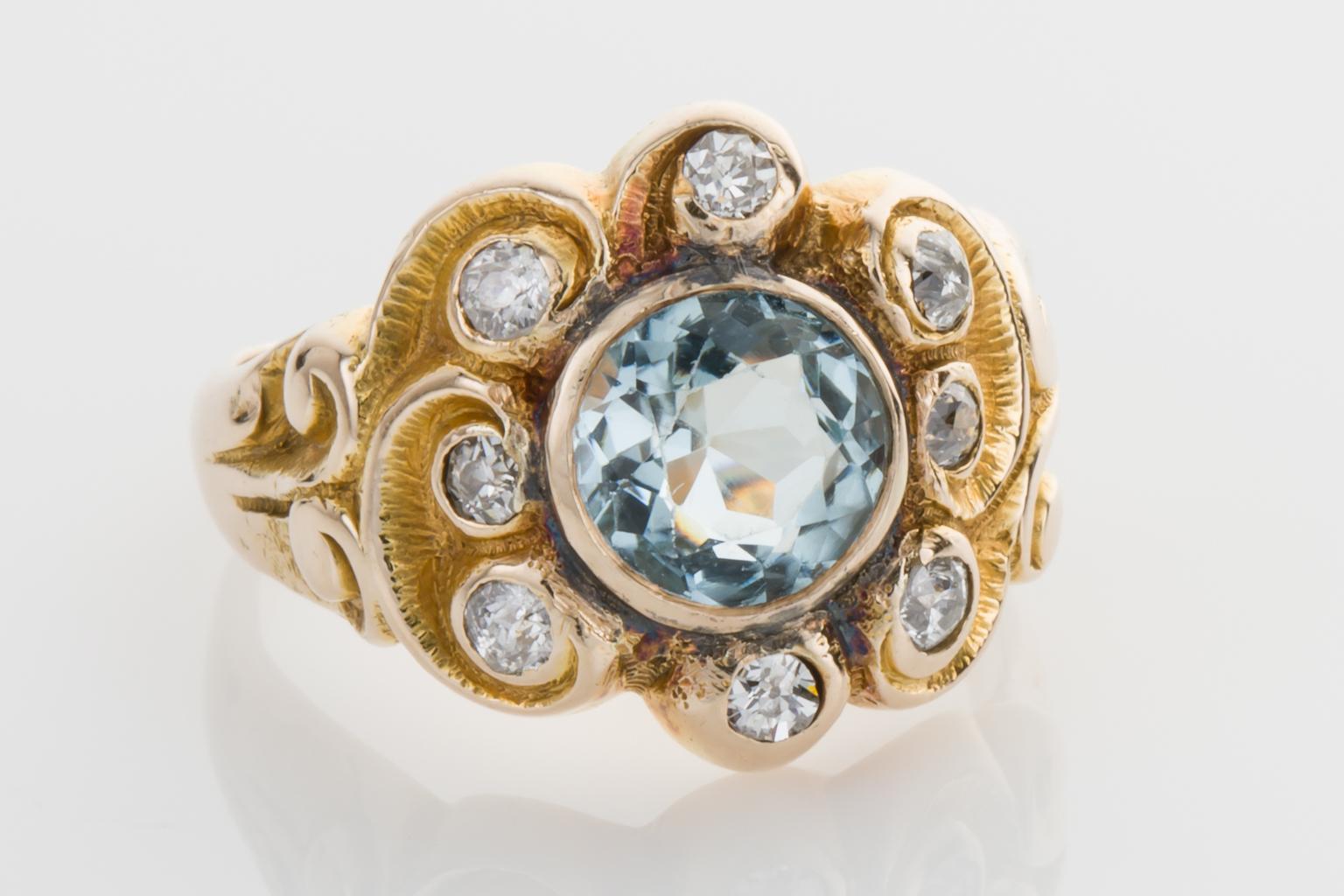 Aquamarine rings are so fashionable and sought after, but what if you love aquamarines and would prefer something that is completely different to what everyone else is wearing?  Here it is!  A classic Art Nouveau ring set with a pretty blue round