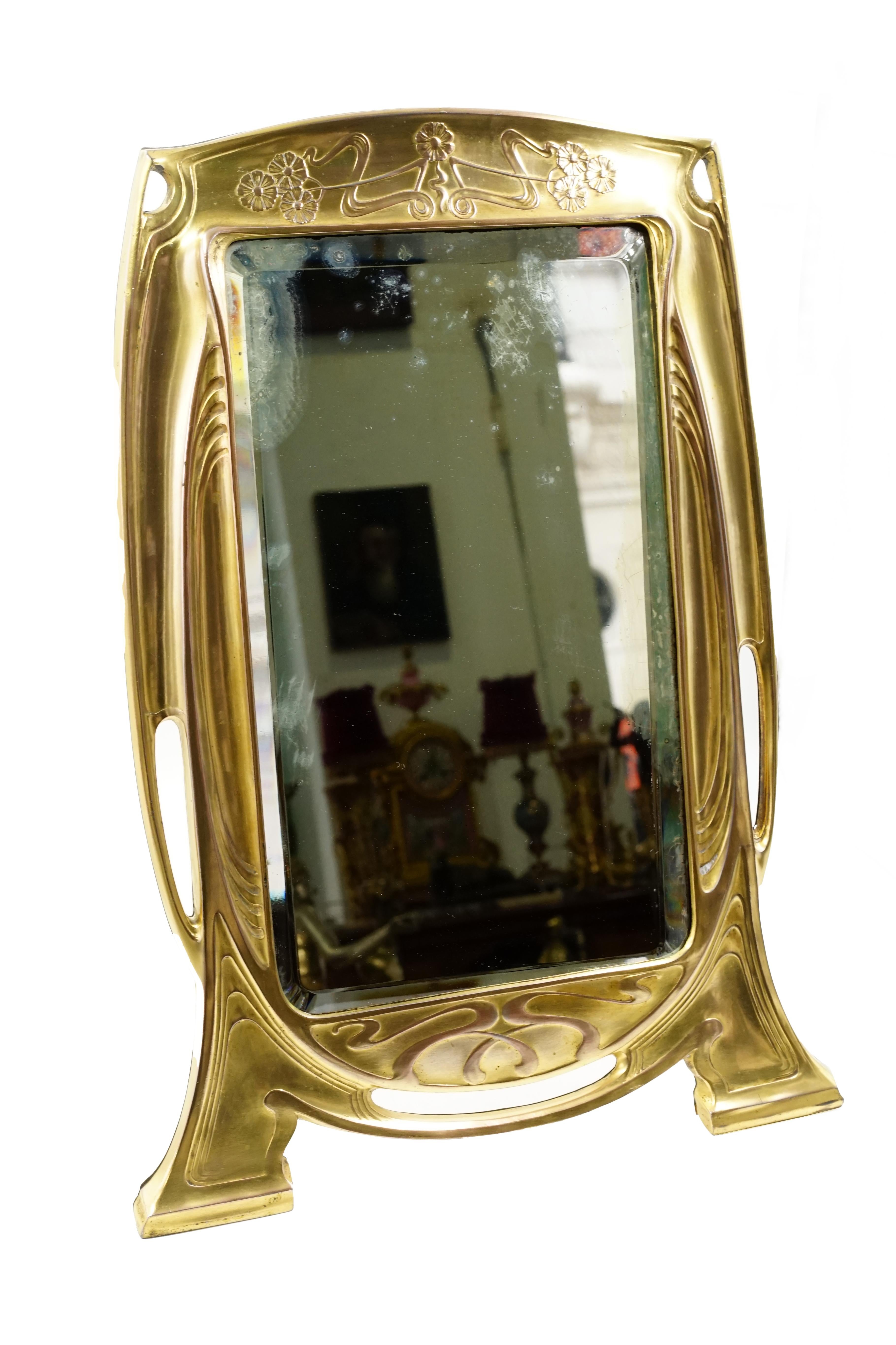 Art nouveau Argentor mirror
Origin Austria Circa 1900
Art nouveay style Creator: Argentor
Gold and electroplated
Very good general condition
natural wear
The history of the company dates back to 1863, when C. A. Münchmeyer & Co. was founded. It was