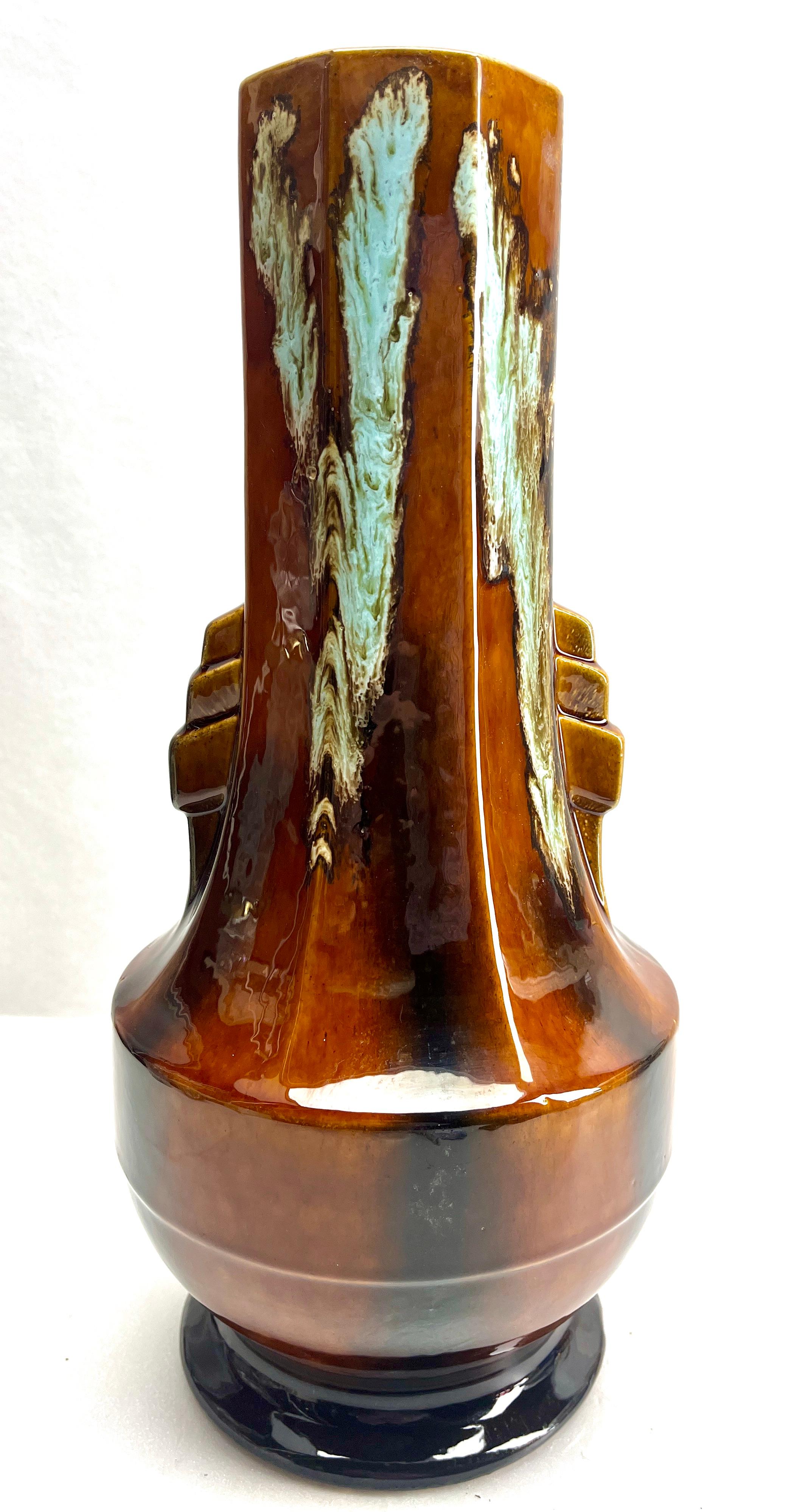 Art Nouveau Art Deco earthenware vase,  made in Belgium. 1930s
Model F-42
Art Nouveau ceramic vase in excellent condition (no crack, no repair to the ceramic).
There are 4 pieces Available in different colors
 
Size: Height 37 cm  Diameter