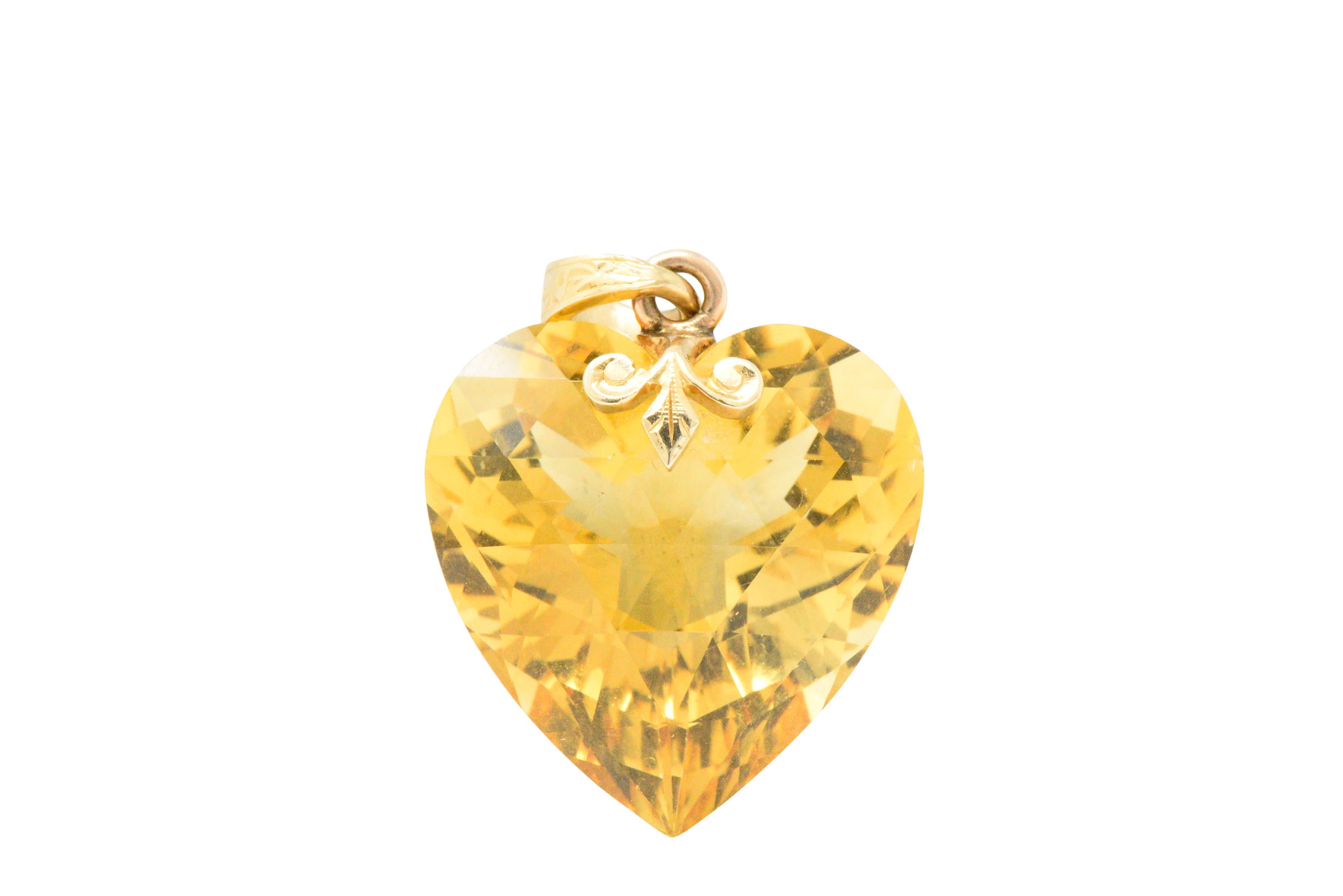 Art Nouveau rose cut citrine weighing approximately 29.57 carats (with bale), bright sunny yellow even color

With a engraved scrolling and almost a fleur-de-lis bale

Bale signed B B & B and numbered 33463

Total Length: Approx. 1 inch

Total
