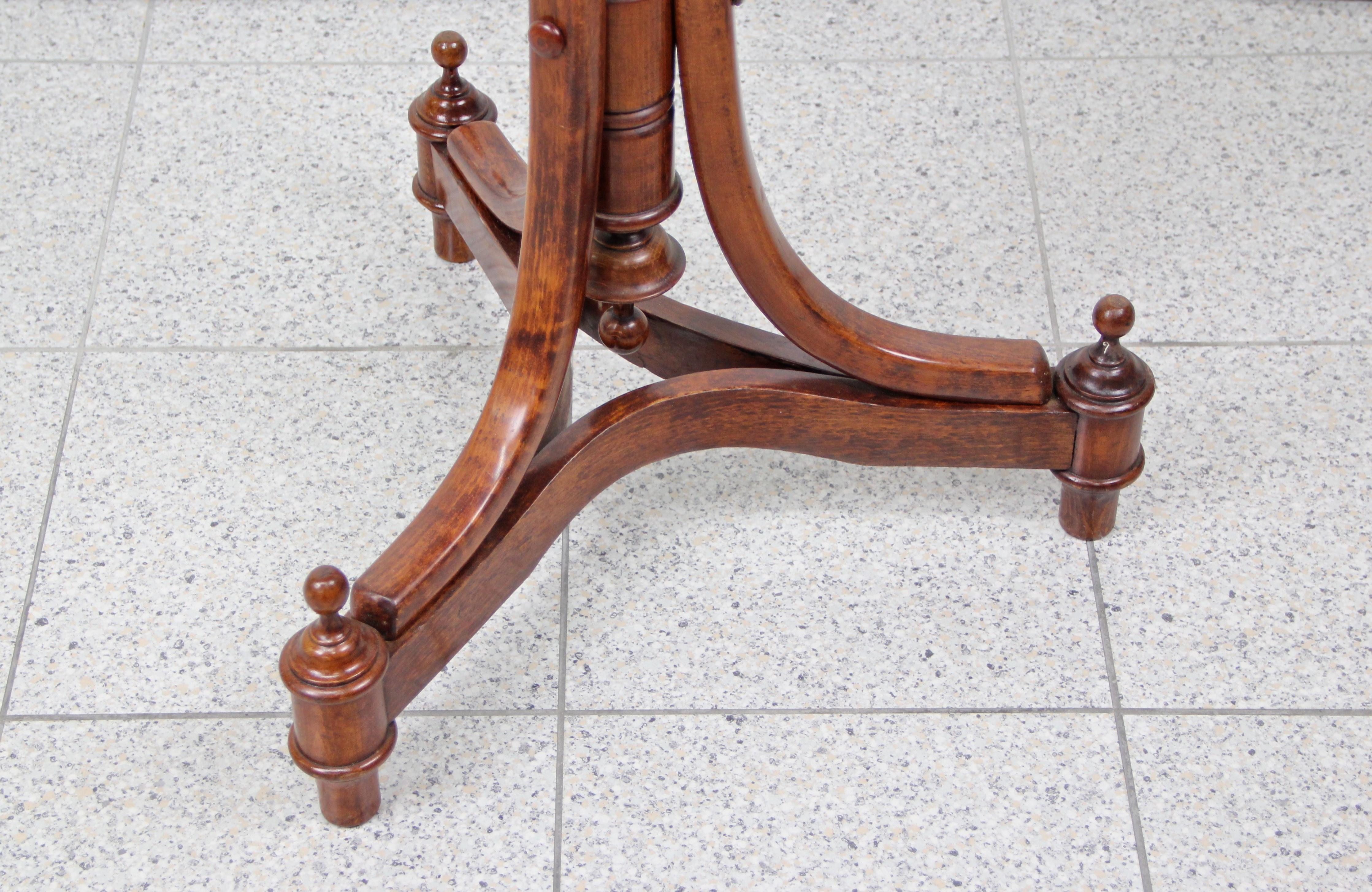 Beautiful shaped Art Nouveau bentwood coffee table or side table from the early 20th century in Austria, circa 1900. An absolute unique designed side table with lovely slender feet and an artfully worked base, showing a lot of small details. This
