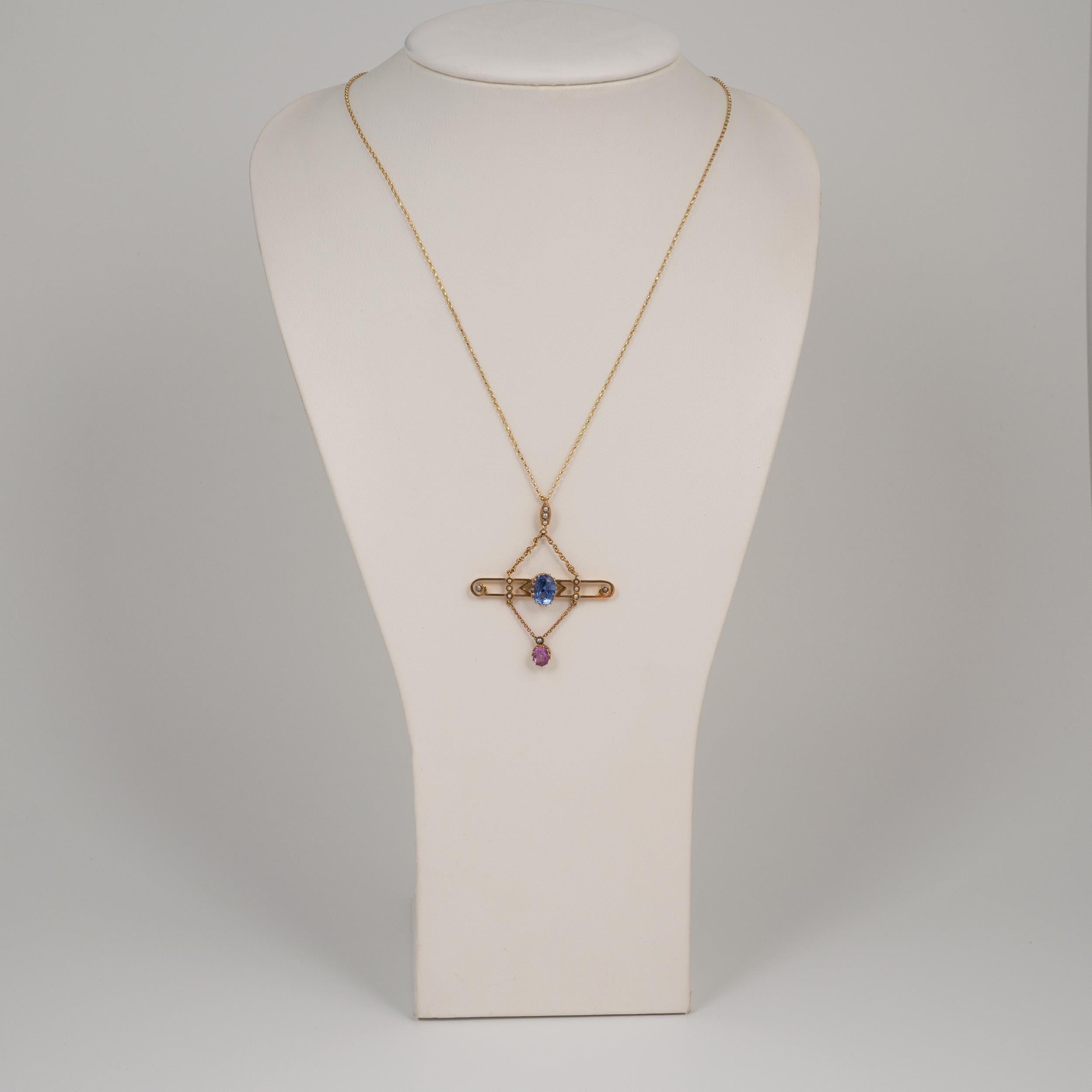 The most exquisite antique sapphire pendant necklace, 15-carat yellow gold, complete with complimentary lightweight 9ct gold belcher chain.

This gorgeous Art Nouveau statement piece is set with cornflower blue sapphire and pink sapphire drop with
