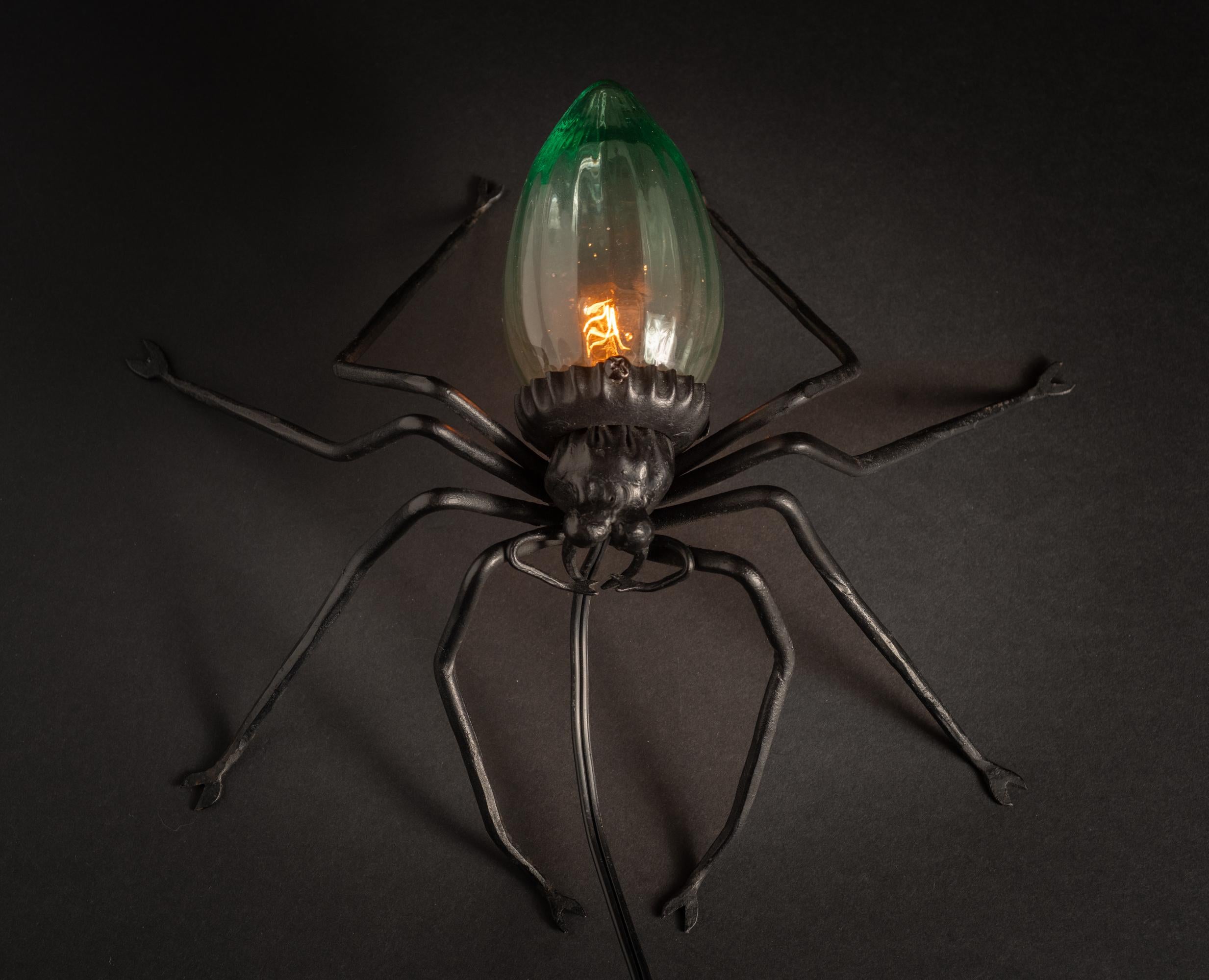 European spider table lamp, c. 1925.

Note: We highly recommend shipping through 1stDibs for its cost effectiveness, full insurance coverage, and reliable handling. While standard parcel services are an option, the default quote does not include