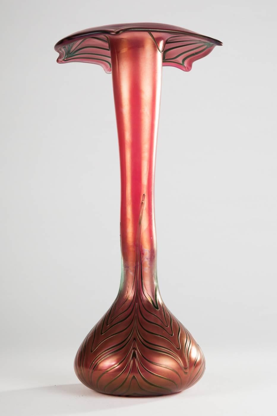 Bohemian glass vase, red tinted glass with spiral melting, 
H. approx. 28 cm, minimally rubbed.