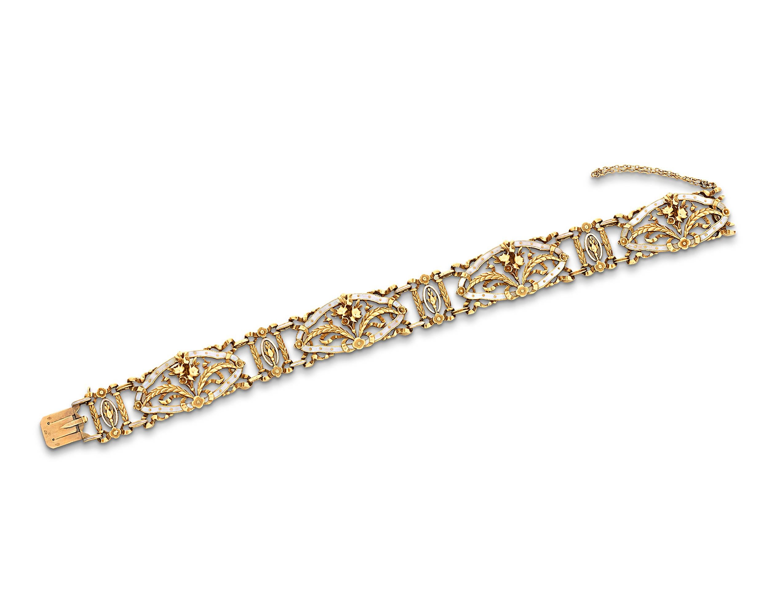 Crafted by the legendary French designer Lucien Gautrait, this extraordinary bracelet is a stunning work of jewelry design. The 18K yellow gold bracelet features an array of florals and festoons that reveal the overlap between Victorian and Art