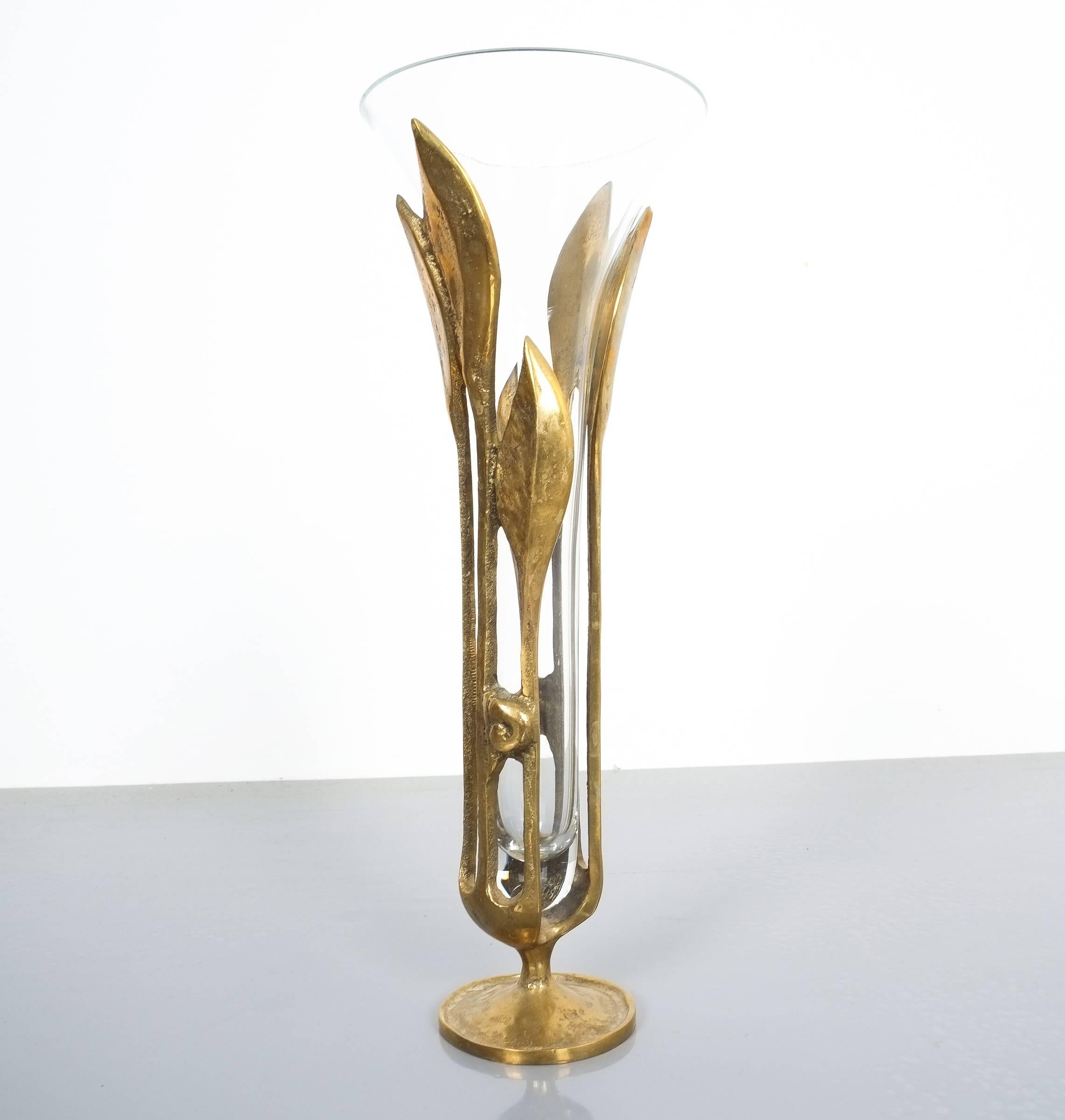 Art Nouveau brass vase, Austria, circa 1910. Beautiful brass and glass vase with a leave like cast brass base and a blown glass tulip. Excellent condition. Measurements are 12.59