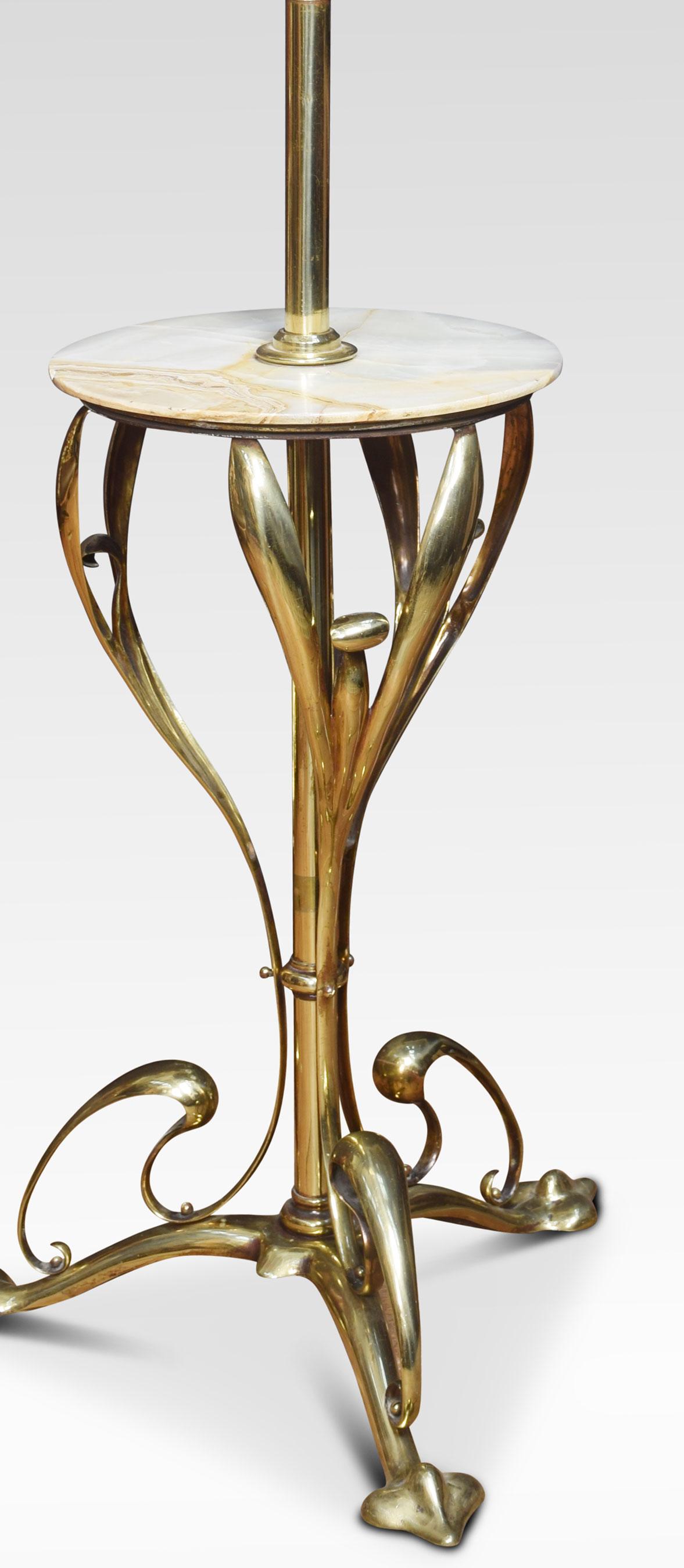 Art Nouveau standard lamp the brass adjustable column supporting a circular white marble tabletop above impressive scrolling supports. All raised up on three pad feet.
Dimensions
Height 66 inches (Adjustable)
Length 22.5 inches
Depth 22.5 inches.