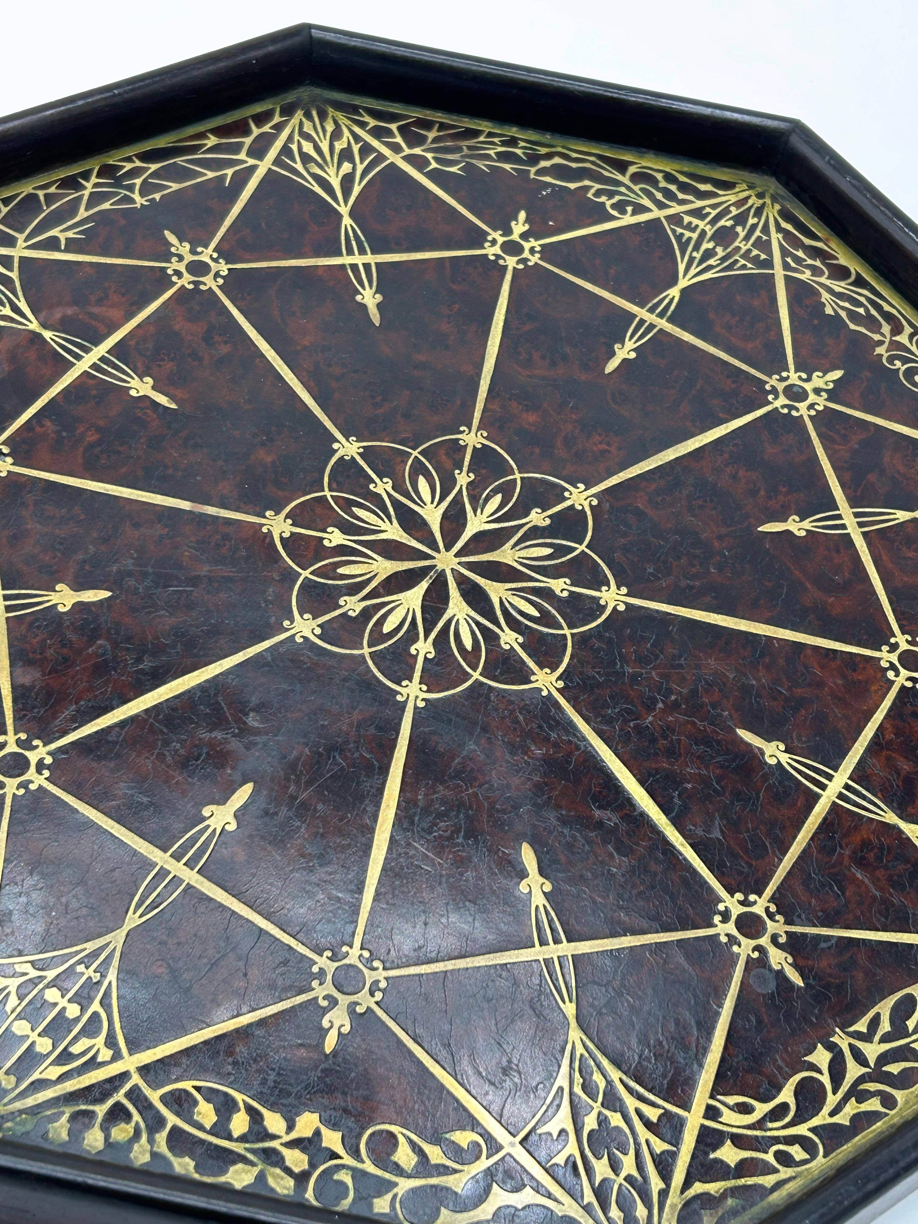 Art Nouveau Brass Inlaid Tray by Erhard & Sohne
This is an antique Erhard & Söhne tray, crafted from dark wood in an octagonal shape. It features an intricate Secessionist design with a central rosette. It is made of amboyna and rosewood. Octagonal