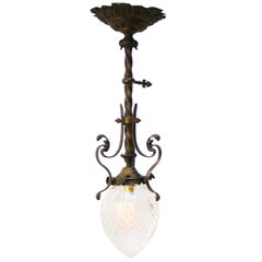 Monture affleurante Art Nouveau en laiton et fer, verre taillé transparent