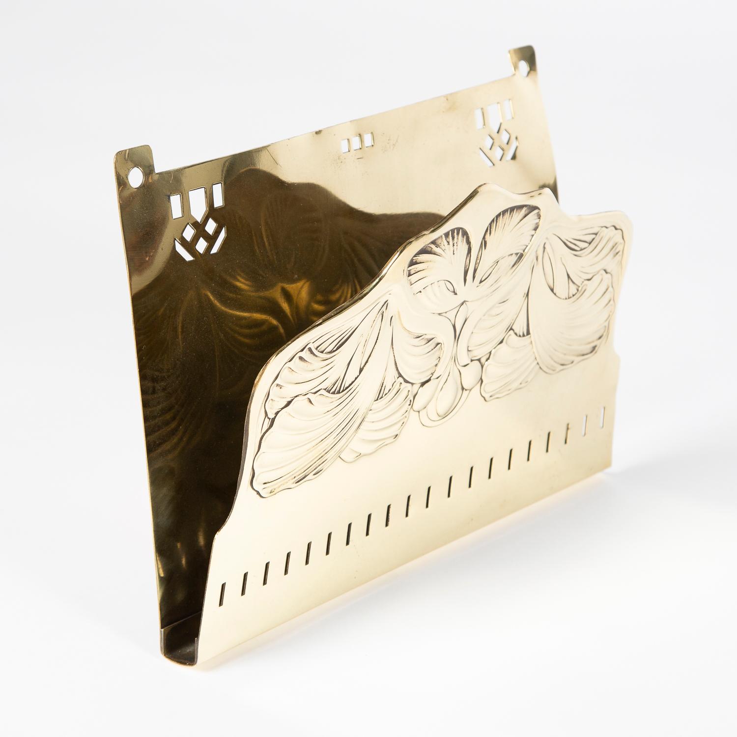 A wall mounted Art Nouveau letter and paper holder.

 