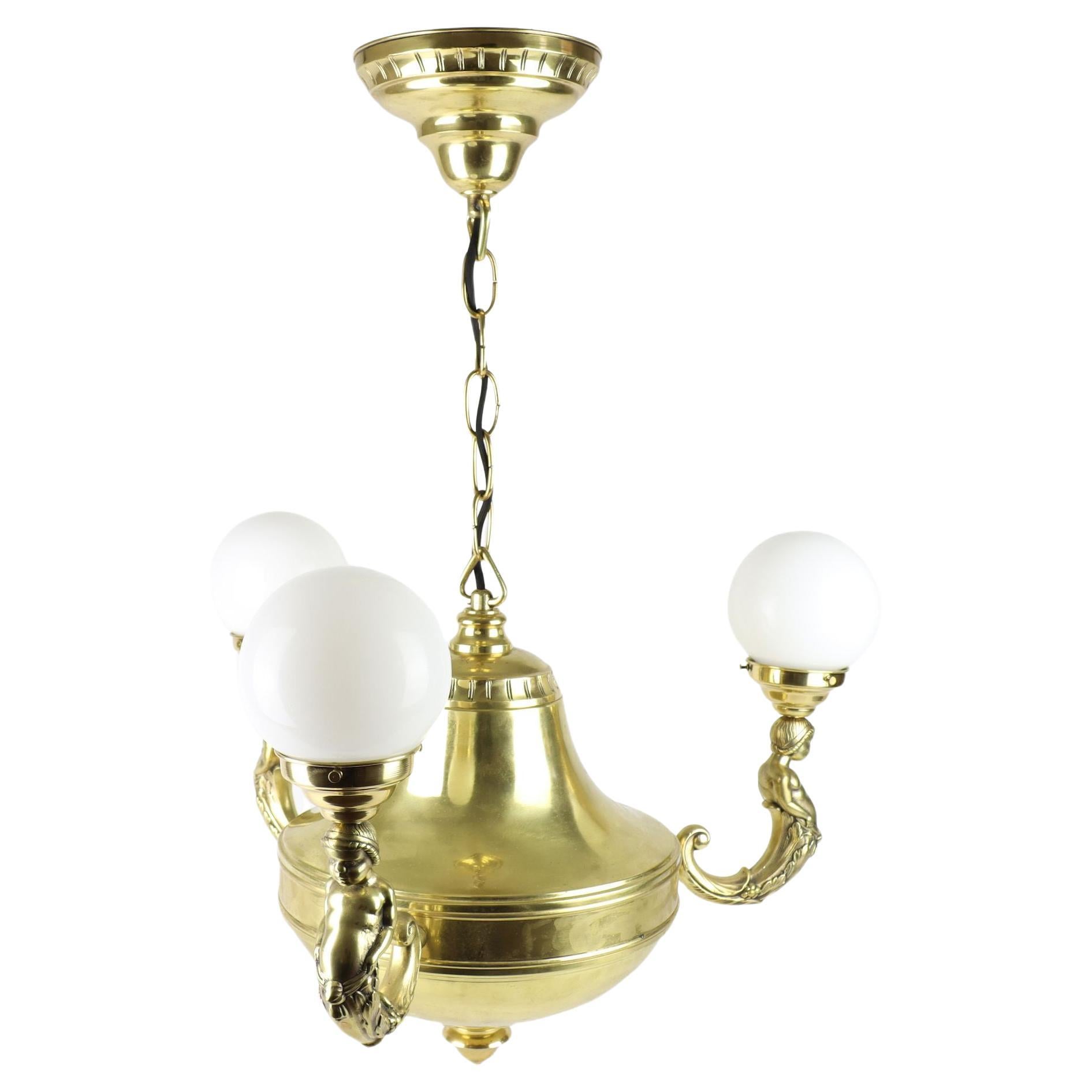 Art Nouveau Brass Representative Figural Chandelier For Sale