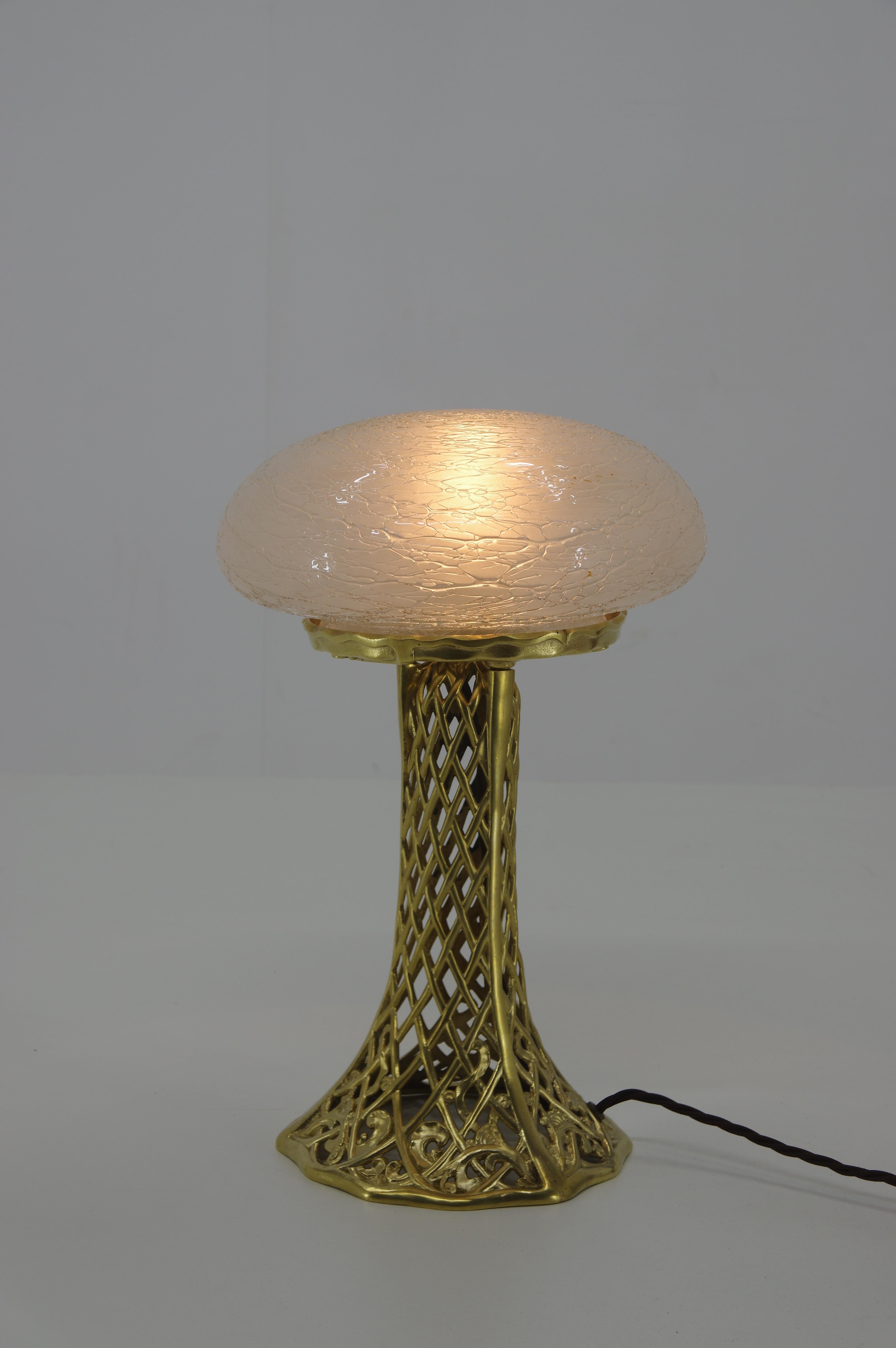 Beautiful Art Nouveau table lamp in a perfect condition, completely restored, new wiring, vintage switch. Glass shade without cracks.
Max 40W, E27 (E26) ceramic and brass socket.
Due to low height of the shade it has to be fitted with bulb with