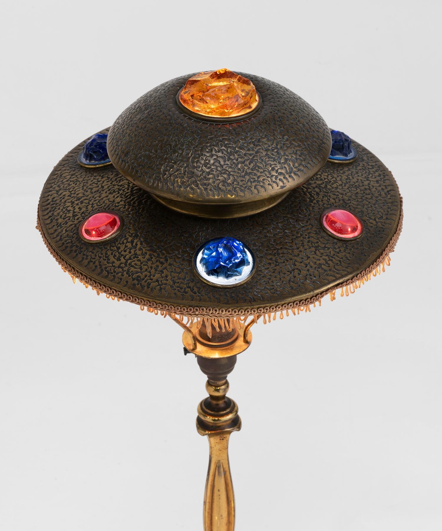 Original, hand beaten brass shade with inset colored glass gems.