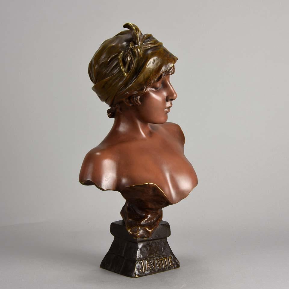 A delightful late 19th century French Art Nouveau bronze bust entitled ‘Javotte’ by Emmanuel Villanis, the bronze with variegated brown patination and intricate hand finished surface detail raised on integral base with raised title, signed E