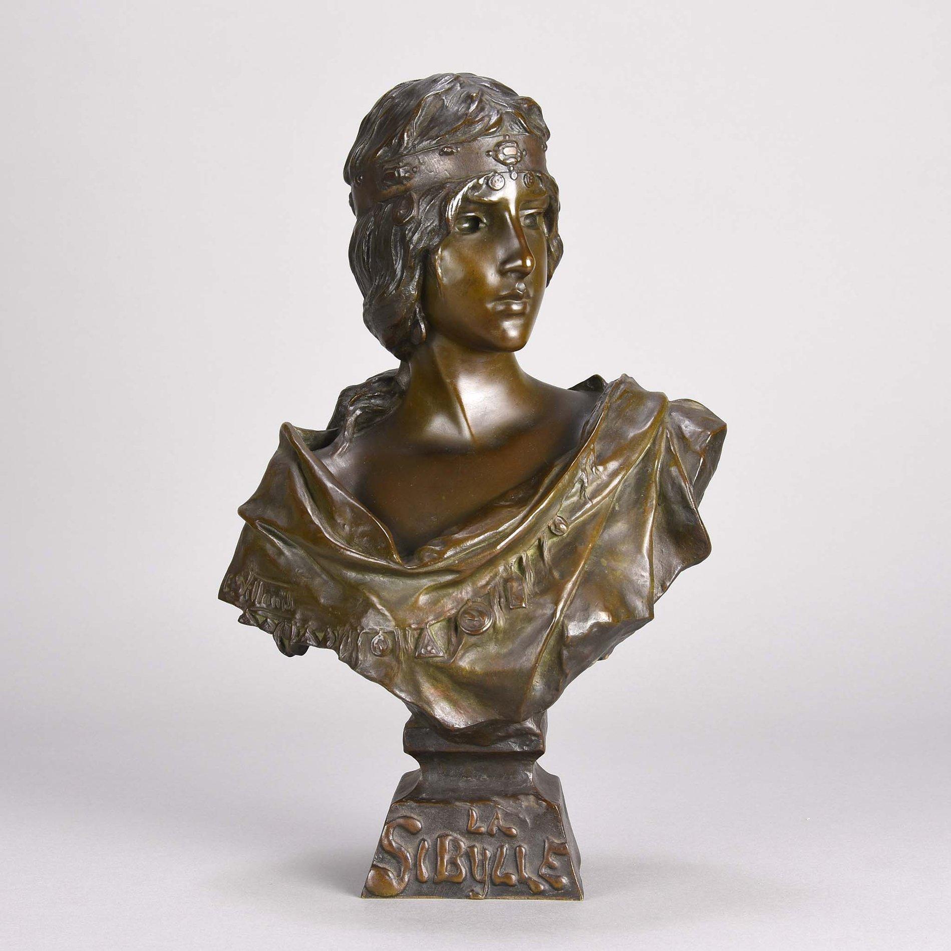 Beautiful late 19th century French Art Nouveau bronze bust of a young classical woman wearing a head dress decorated with medallions exhibiting good hand finished surface detail and rich brown and green patina. Titled, signed E Villanis and stamped